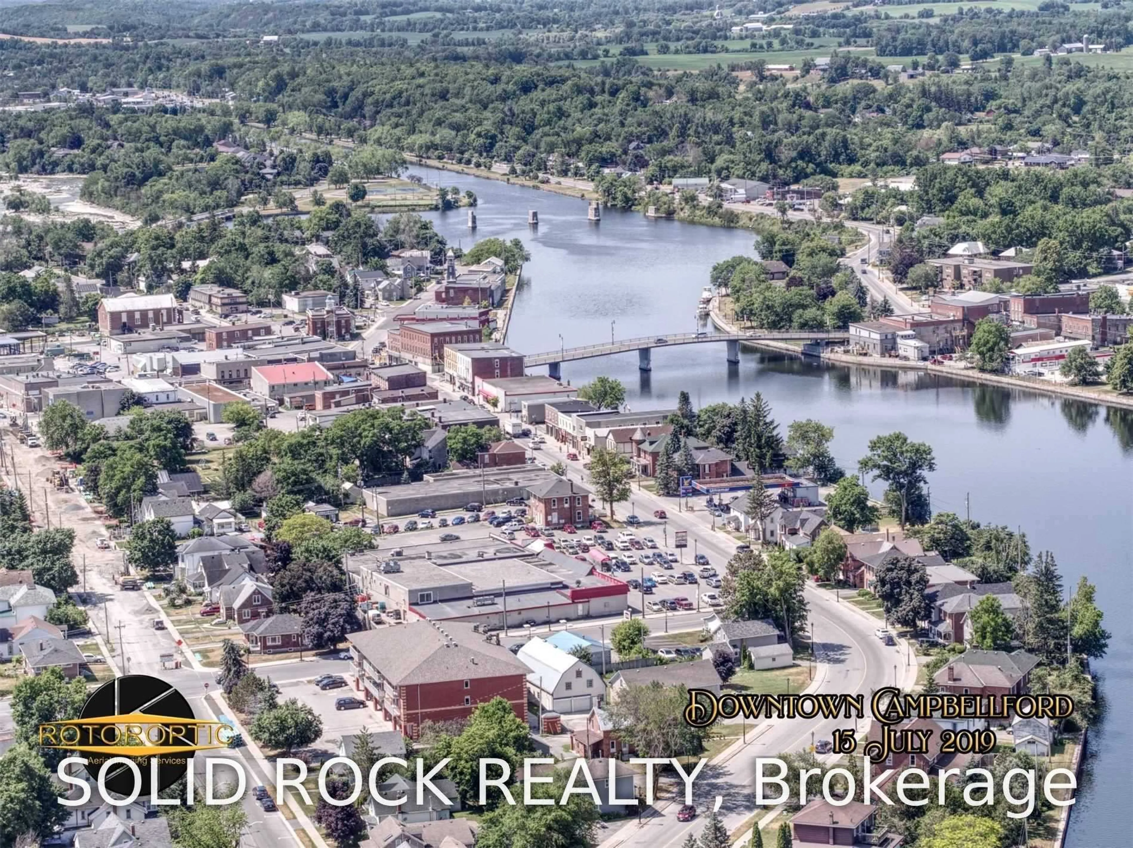 A pic from outside/outdoor area/front of a property/back of a property/a pic from drone, water/lake/river/ocean view for 18-22 Bridge St, Trent Hills Ontario K0L 1L0