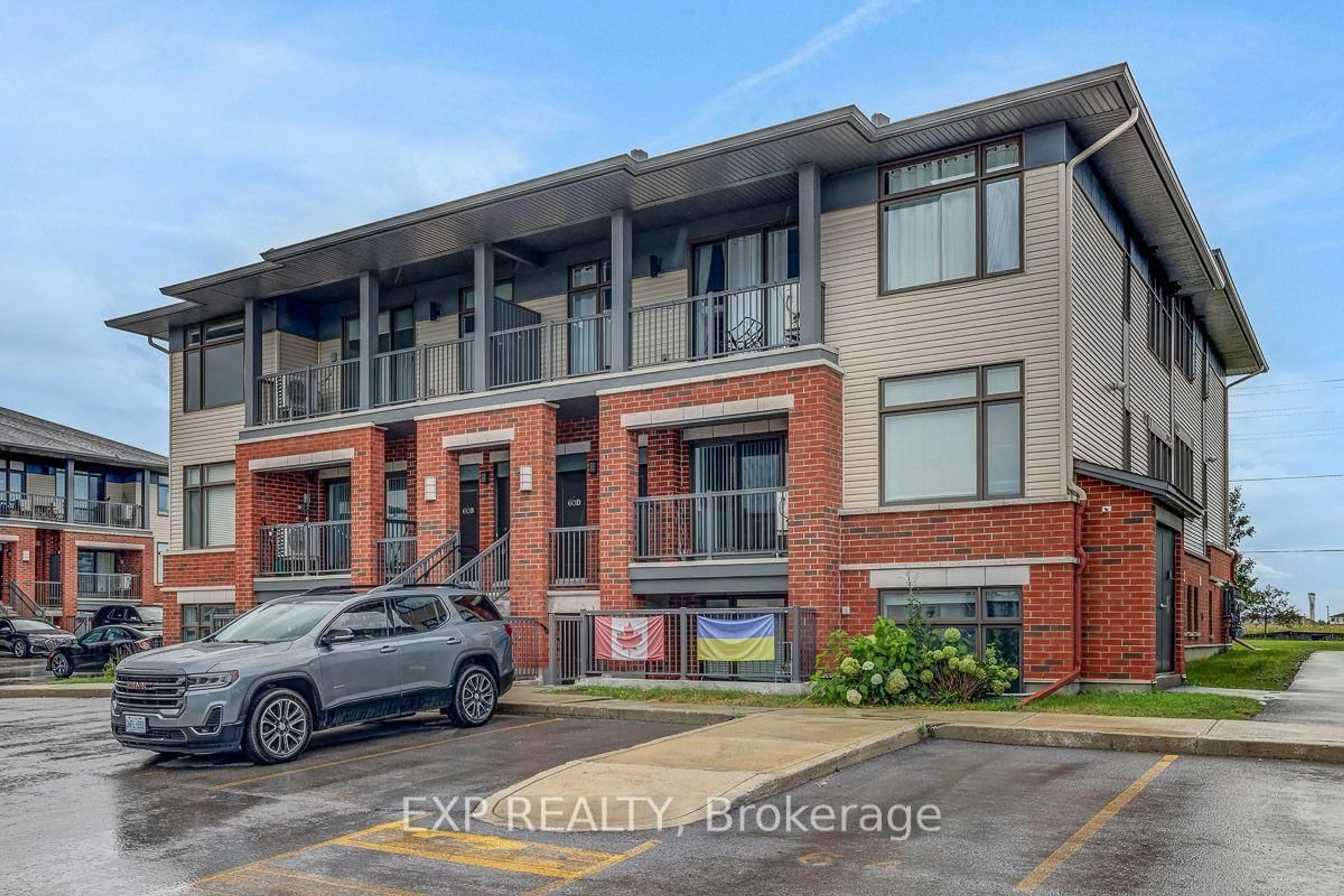 Home with brick exterior material, street for 60 Jaguar Private #C, Ottawa Ontario K2V 0J2