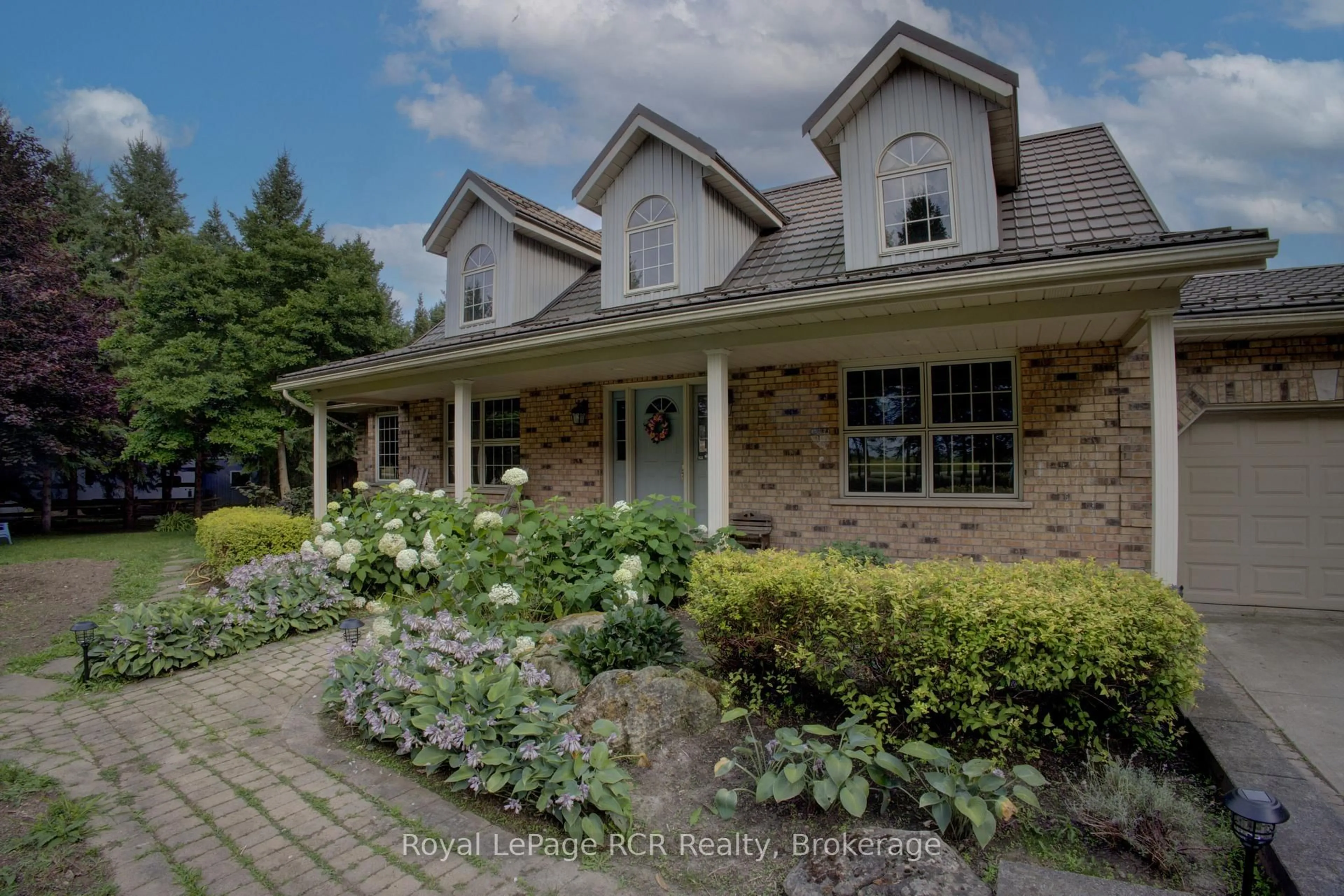Home with brick exterior material, street for 8187 Wellington Road 109 Rd, Wellington North Ontario N0G 1A0