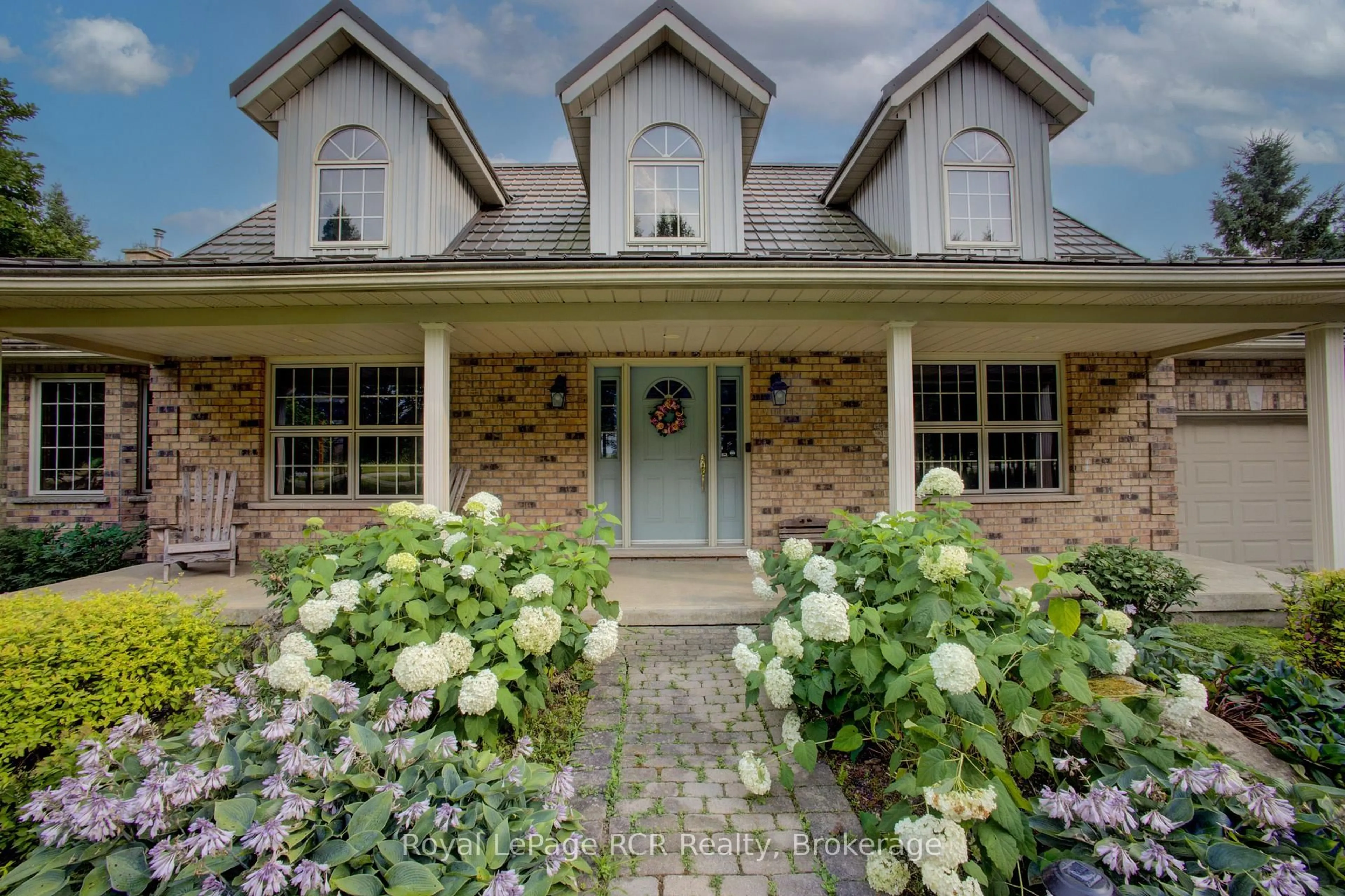 Home with brick exterior material, street for 8187 Wellington Road 109 Rd, Wellington North Ontario N0G 1A0
