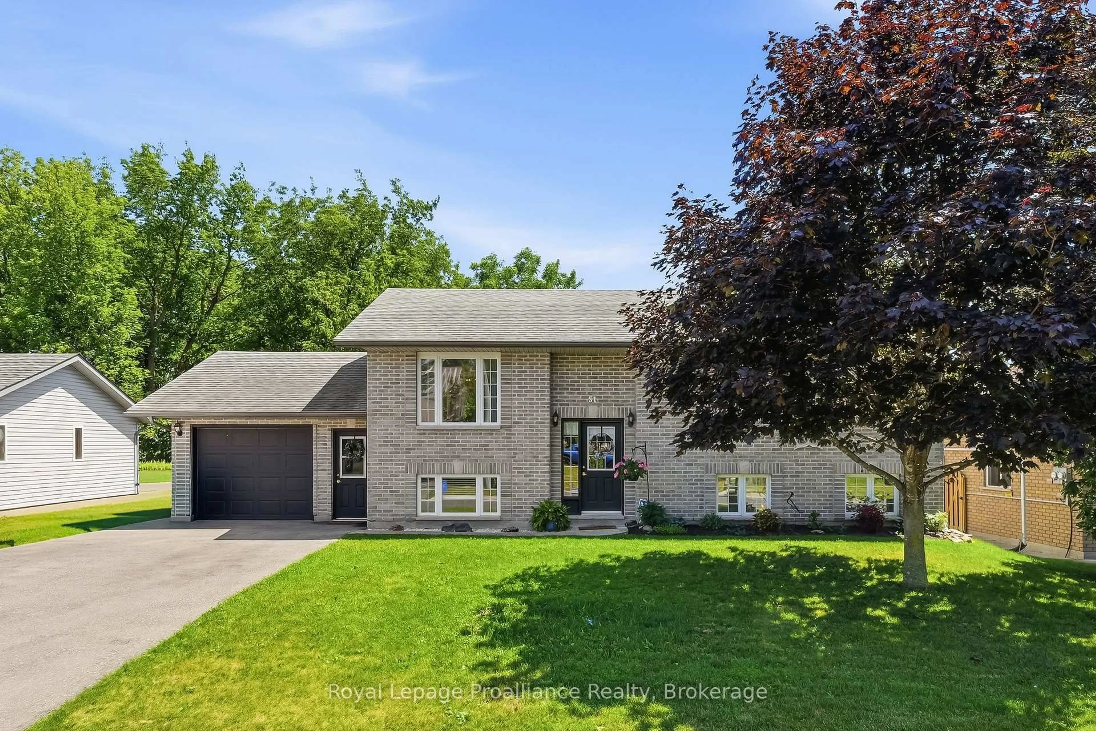 Home with vinyl exterior material, street for 51 Richardson St, Brighton Ontario K0K 1H0