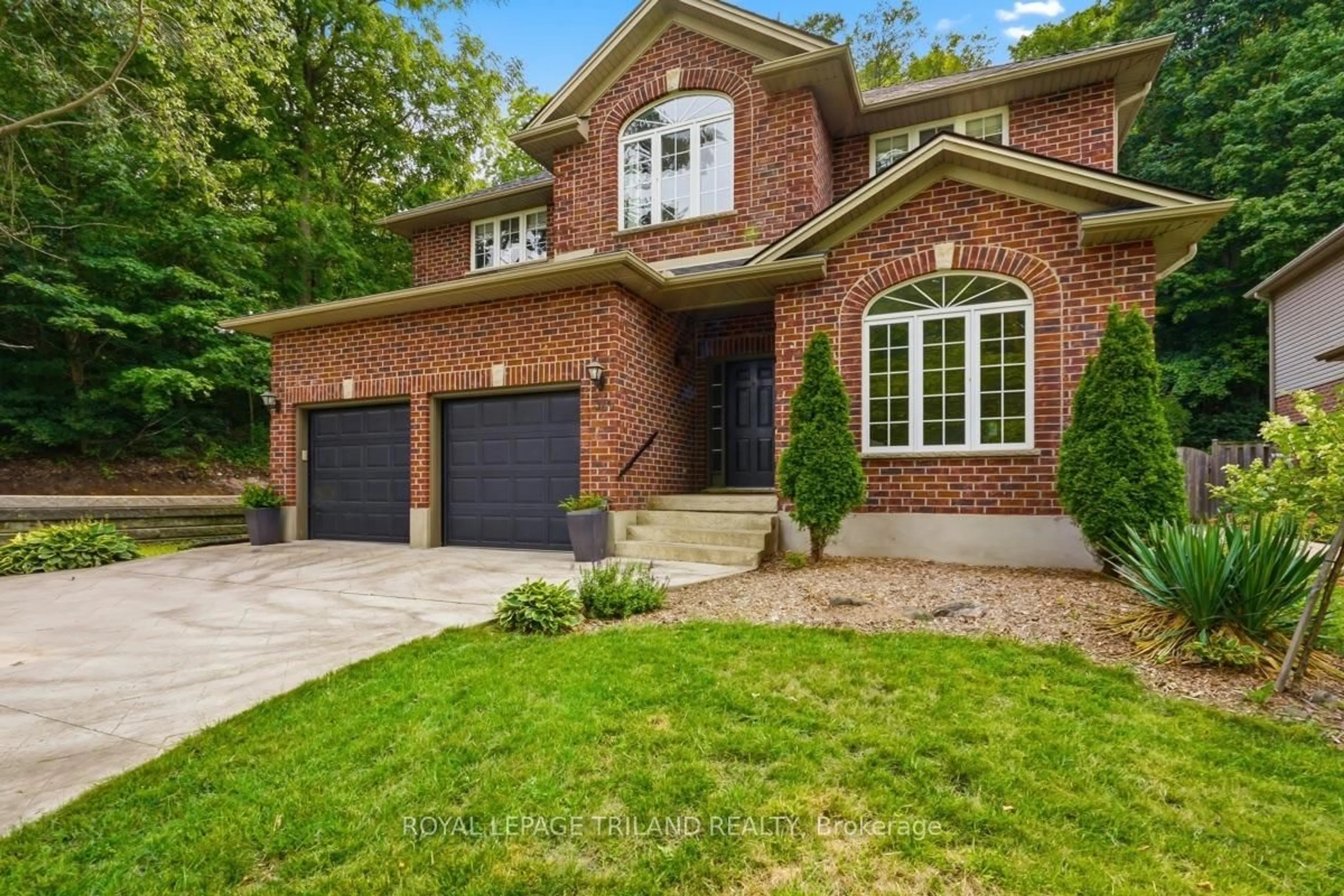 Home with brick exterior material, street for 365 Richmeadow Rd, London North Ontario N6H 5T2