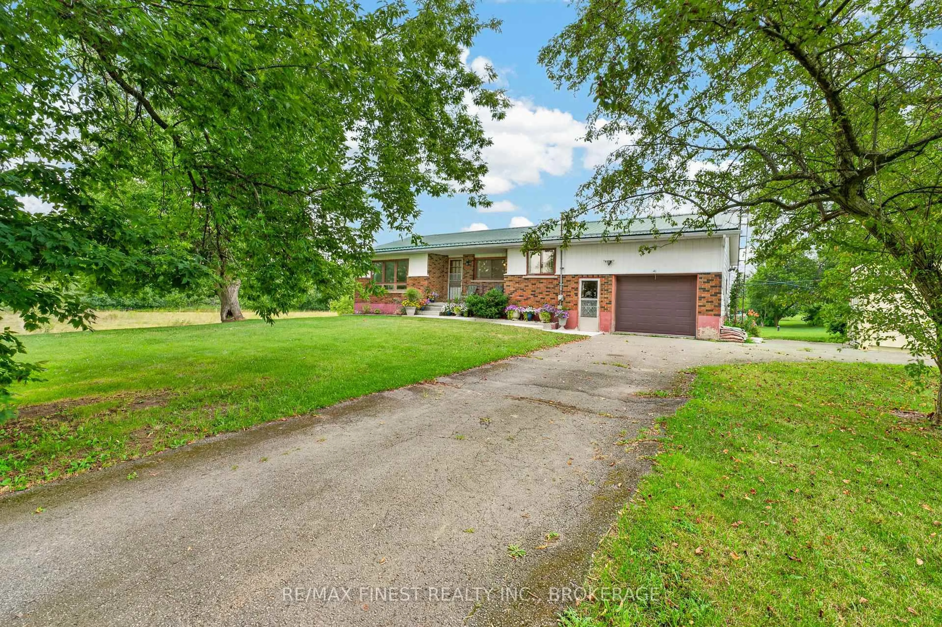 A pic from outside/outdoor area/front of a property/back of a property/a pic from drone, street for 607 Fitchett Rd, Napanee Ontario K7R 3K8