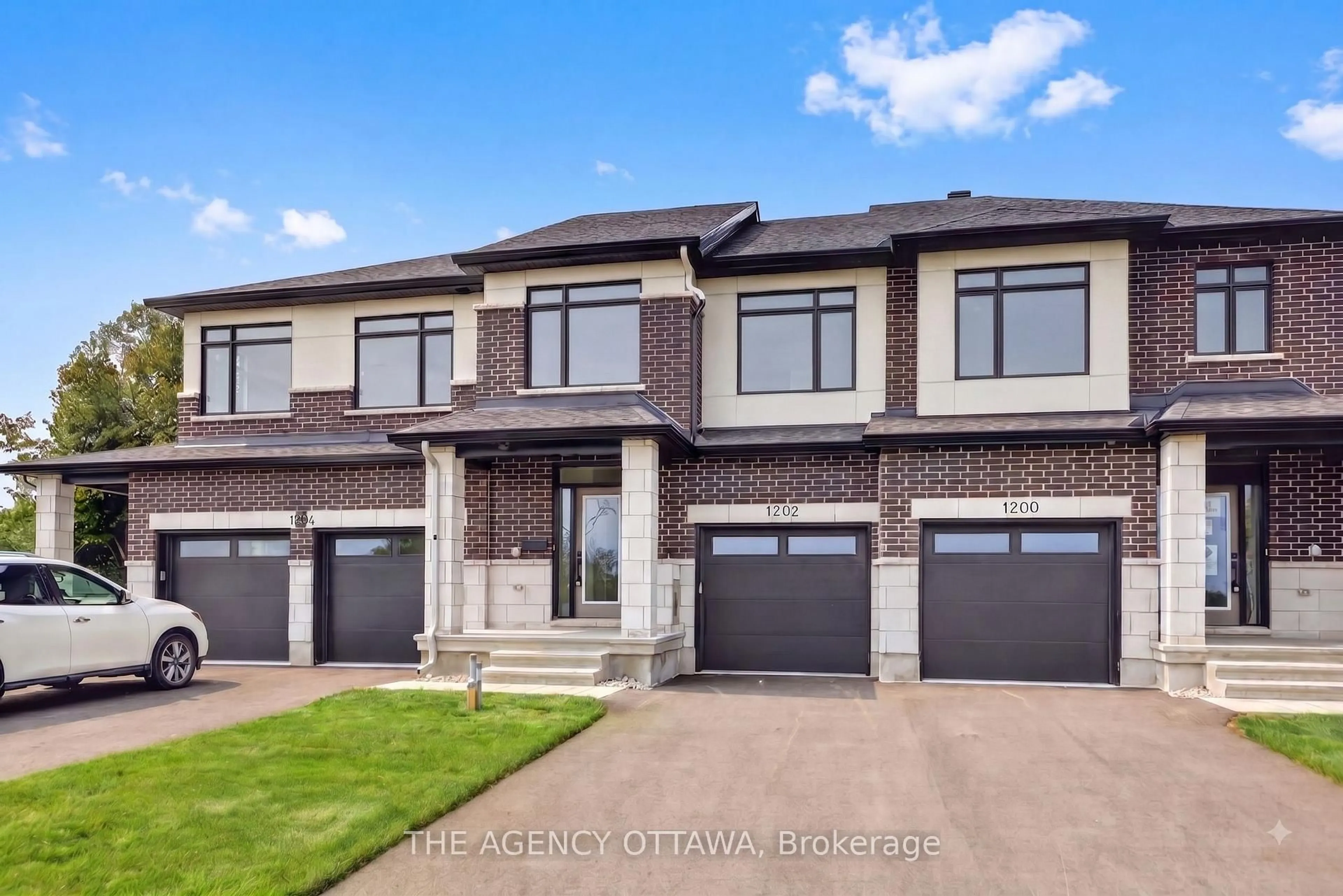 Home with brick exterior material, street for 1202 Spoor St, Ottawa Ontario K2K 1X7
