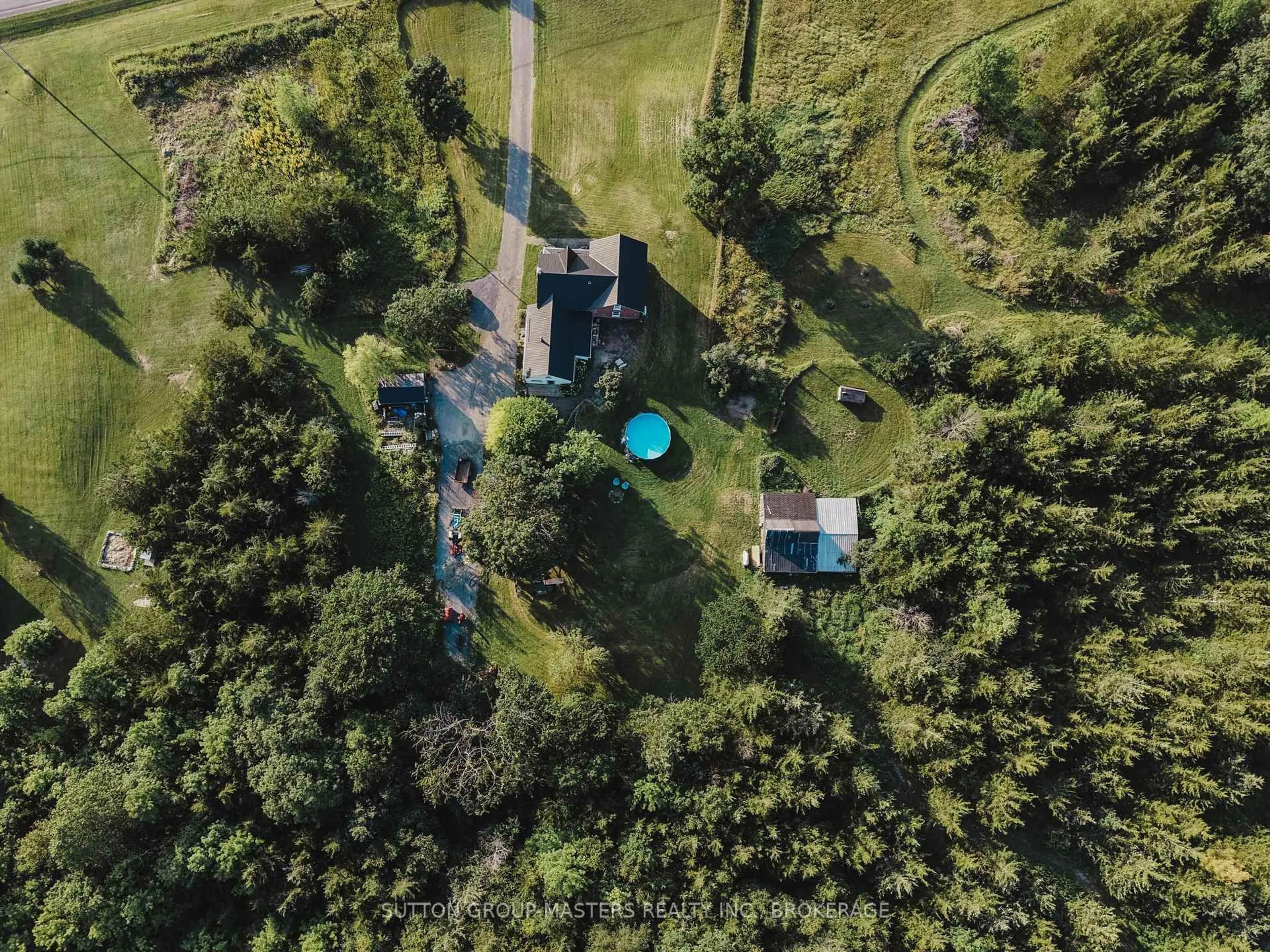 A pic from outside/outdoor area/front of a property/back of a property/a pic from drone, forest/trees view for 3858 County Rd 1 Rd, Yarker Ontario K0K 3N0