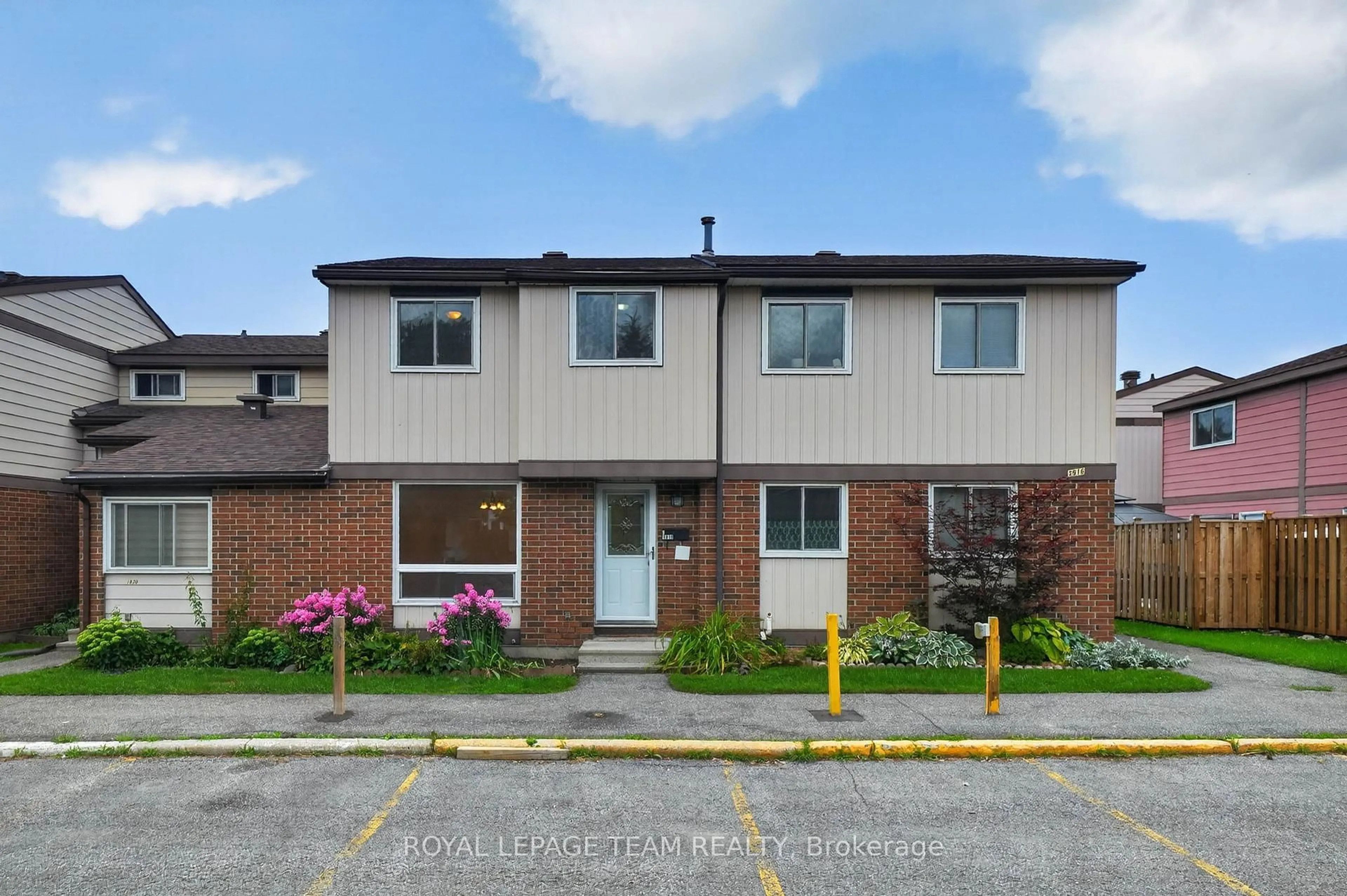 Home with brick exterior material, street for 1918 Belmore Lane #13, Ottawa Ontario K1B 4Z8