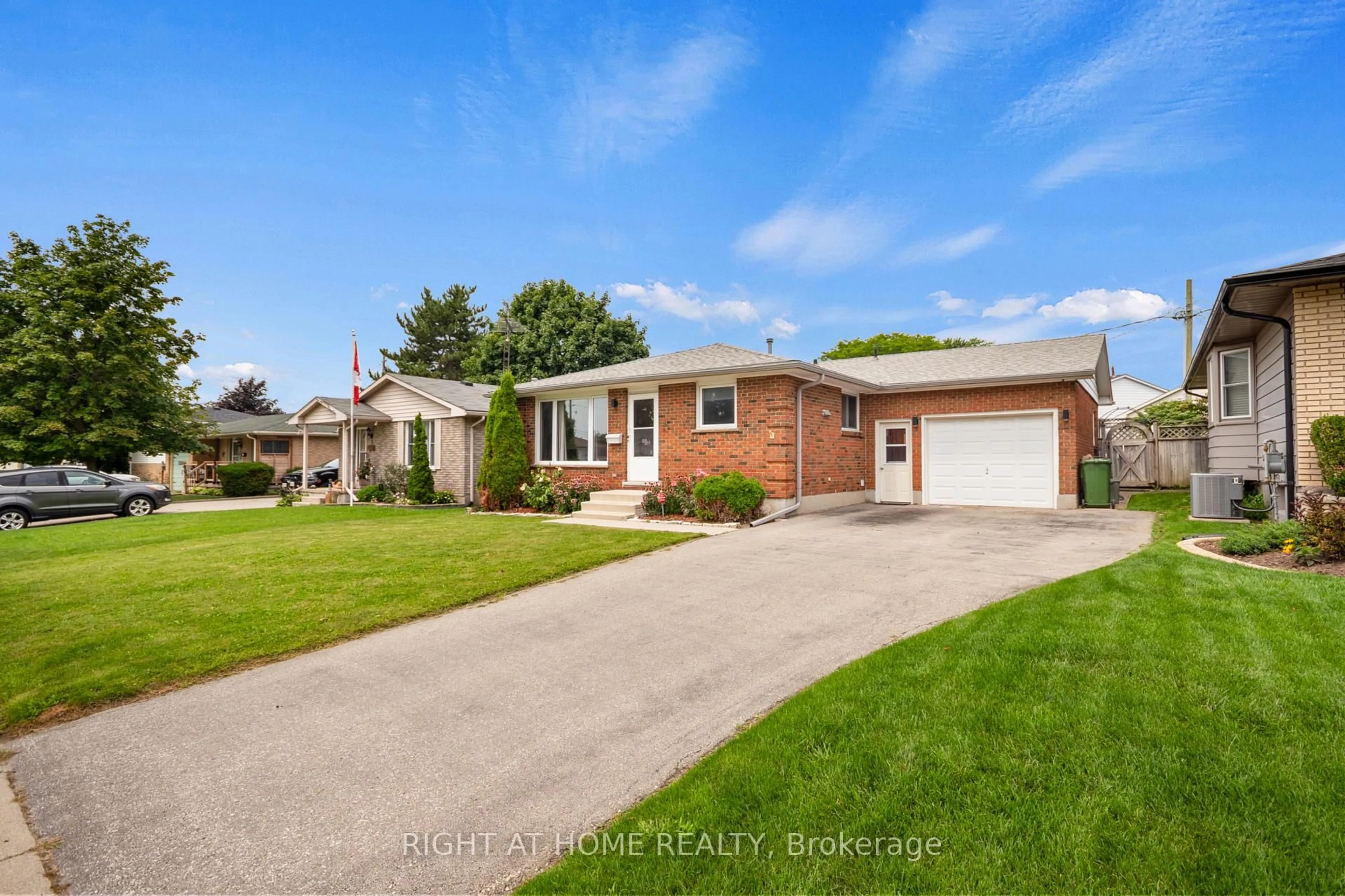 Home with brick exterior material, street for 7 Raven Ave, St. Thomas Ontario N5R 5K8
