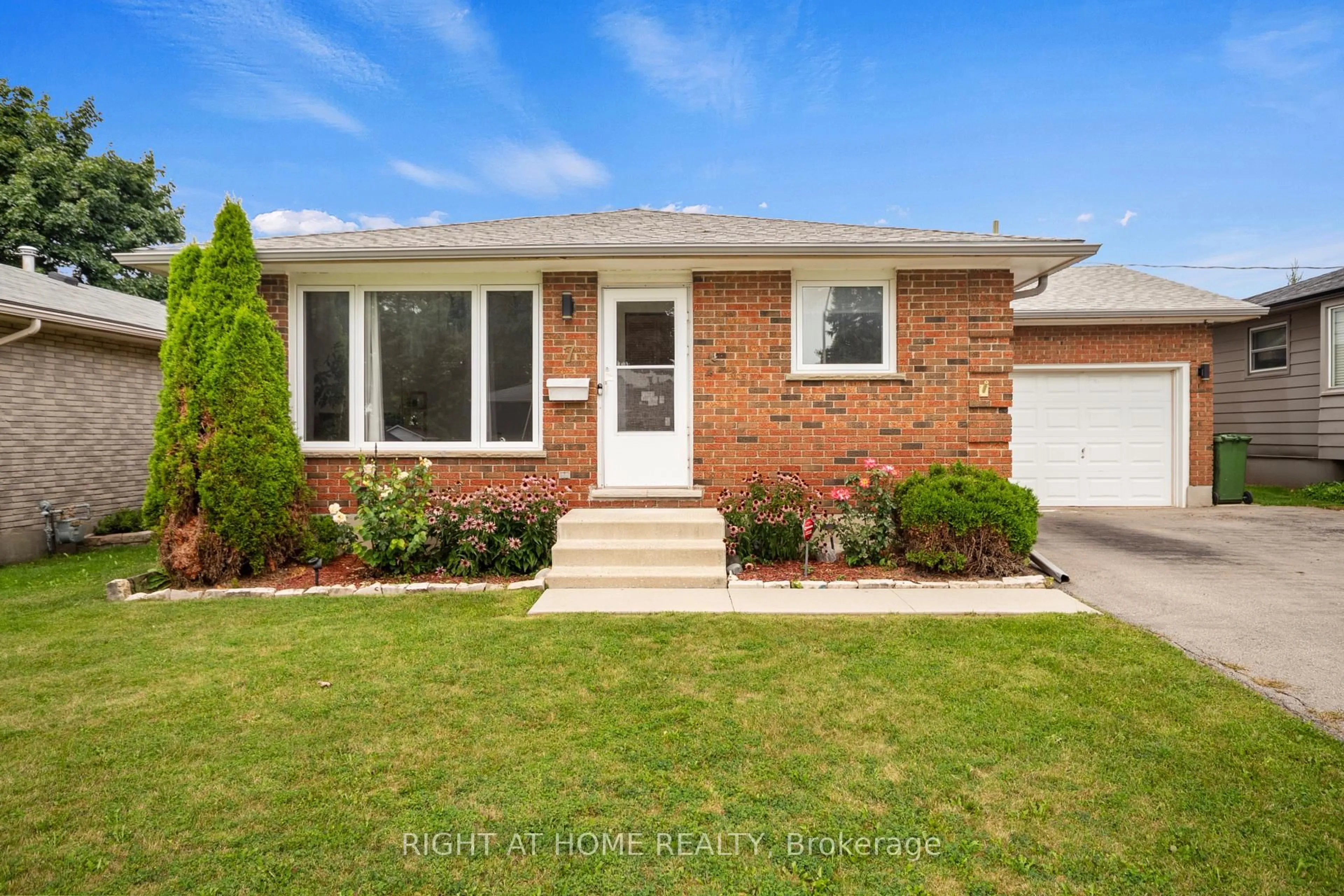 Home with brick exterior material, street for 7 Raven Ave, St. Thomas Ontario N5R 5K8
