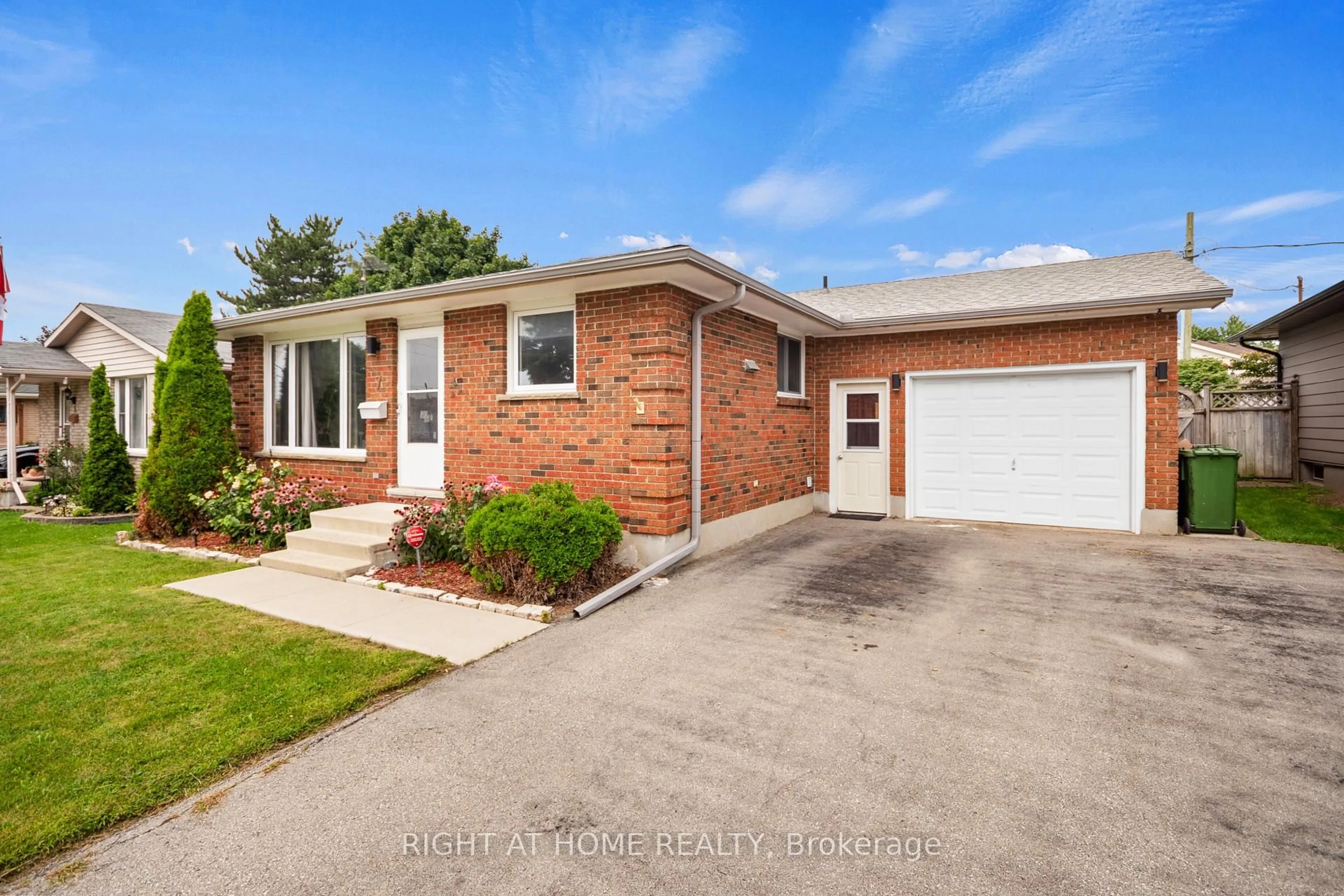 Home with brick exterior material, street for 7 Raven Ave, St. Thomas Ontario N5R 5K8