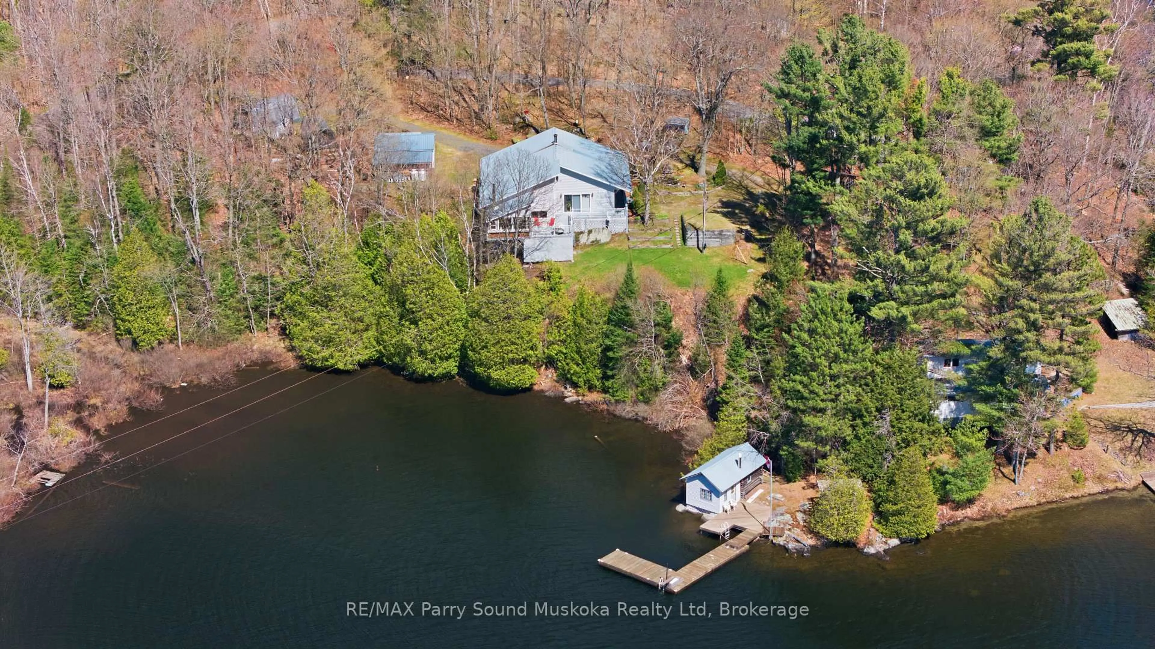 A pic from outside/outdoor area/front of a property/back of a property/a pic from drone, water/lake/river/ocean view for 39 LITTLE FINLAND Rd, Seguin Ontario P2A 0B2