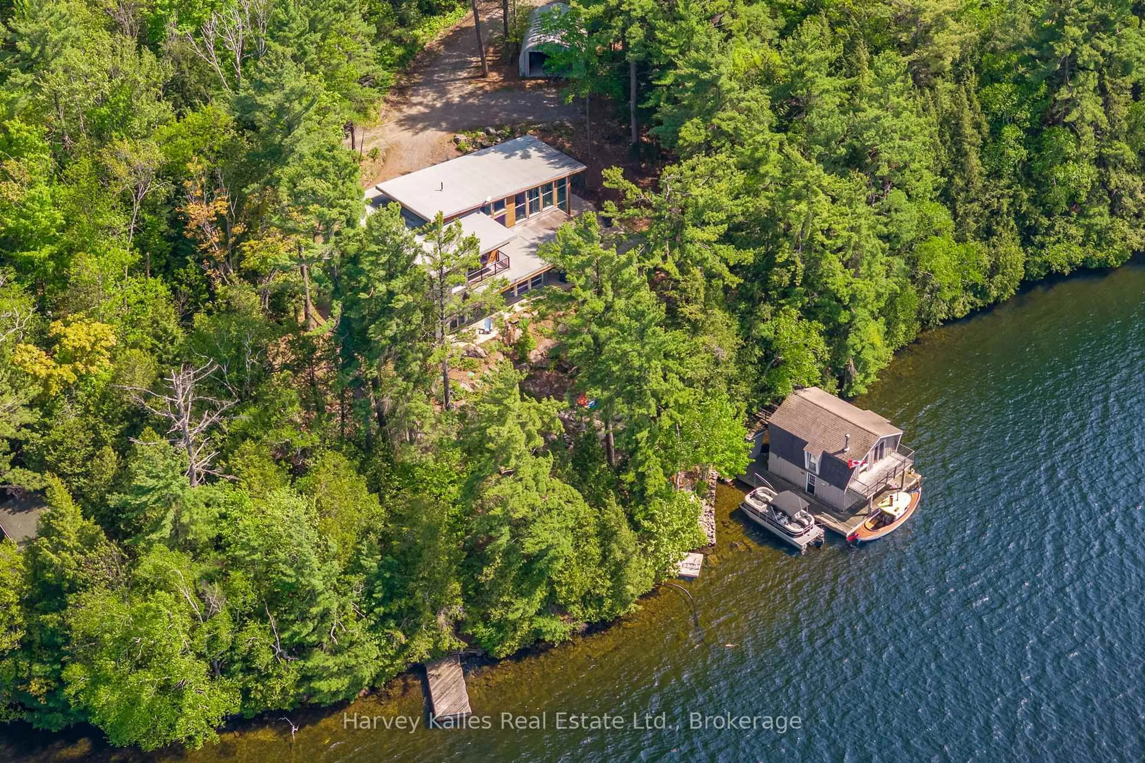 A pic from outside/outdoor area/front of a property/back of a property/a pic from drone, water/lake/river/ocean view for 43 Houston Lane, Seguin Ontario P2A 0B2
