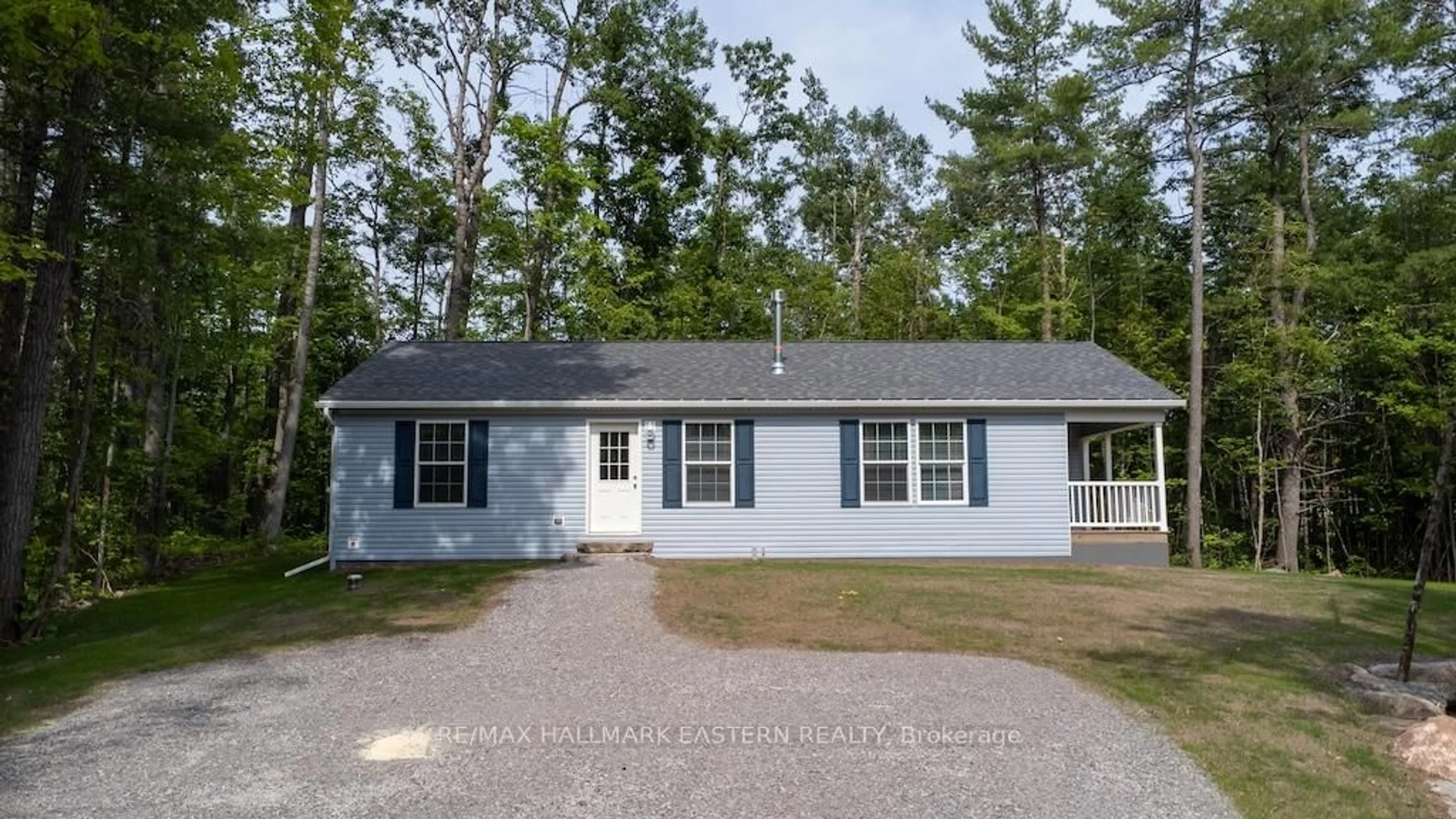 Home with vinyl exterior material, street for 20 Laplante Rd, Trent Lakes Ontario K0M 1A0
