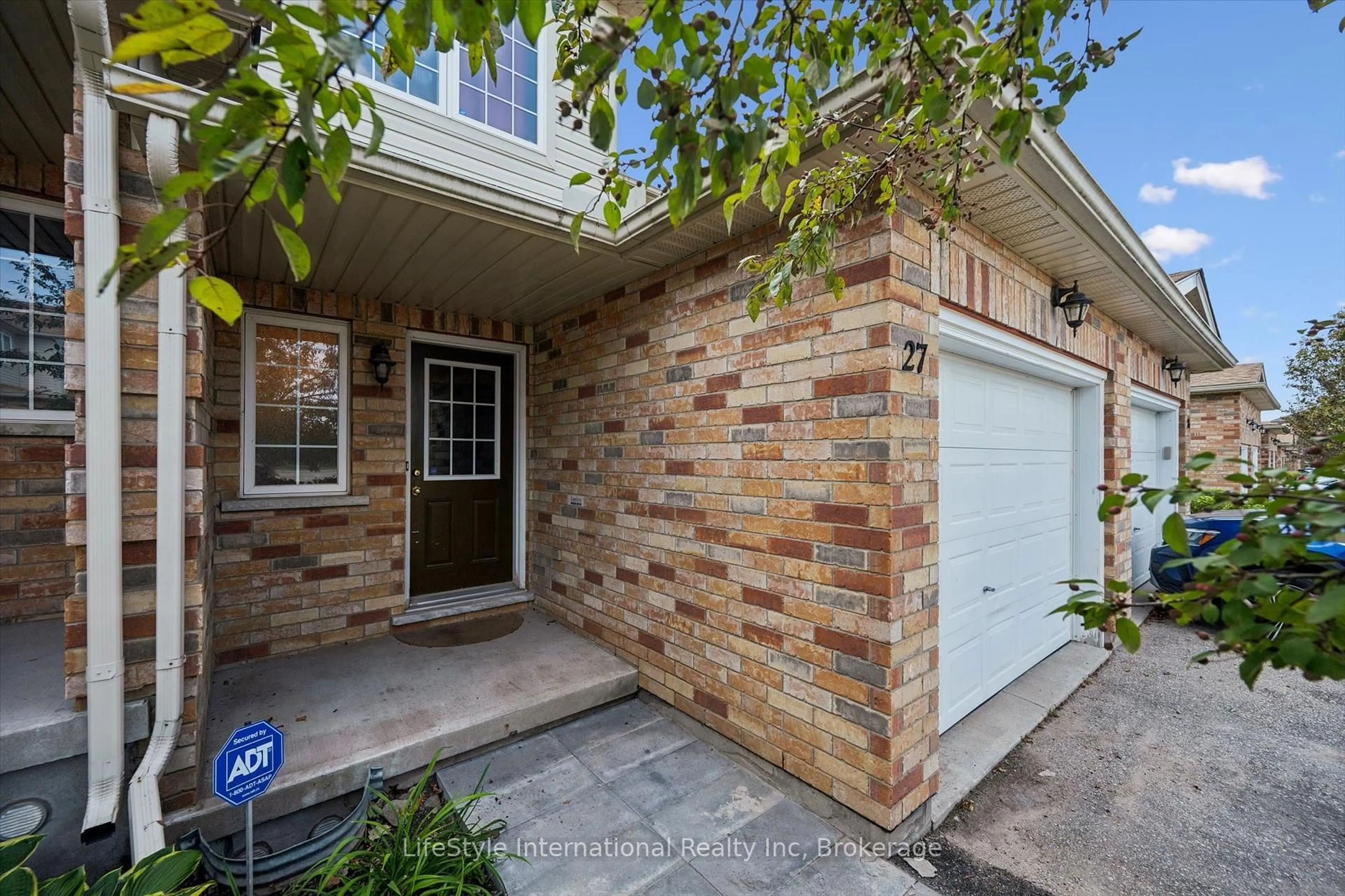 Home with brick exterior material, street for 105 Bard Blvd #27, Guelph Ontario N1L 0E2