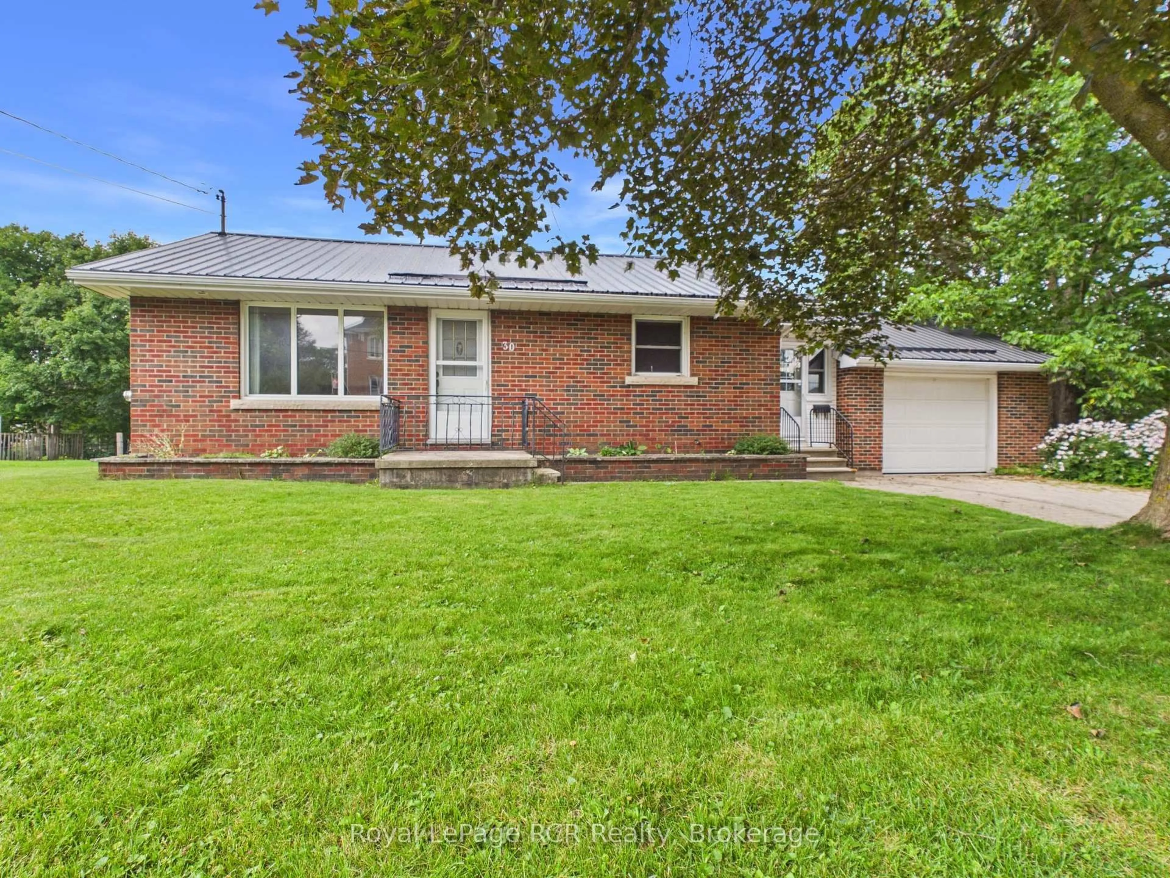 Home with brick exterior material, street for 30 Mark St, Grey Highlands Ontario N0C 1H0