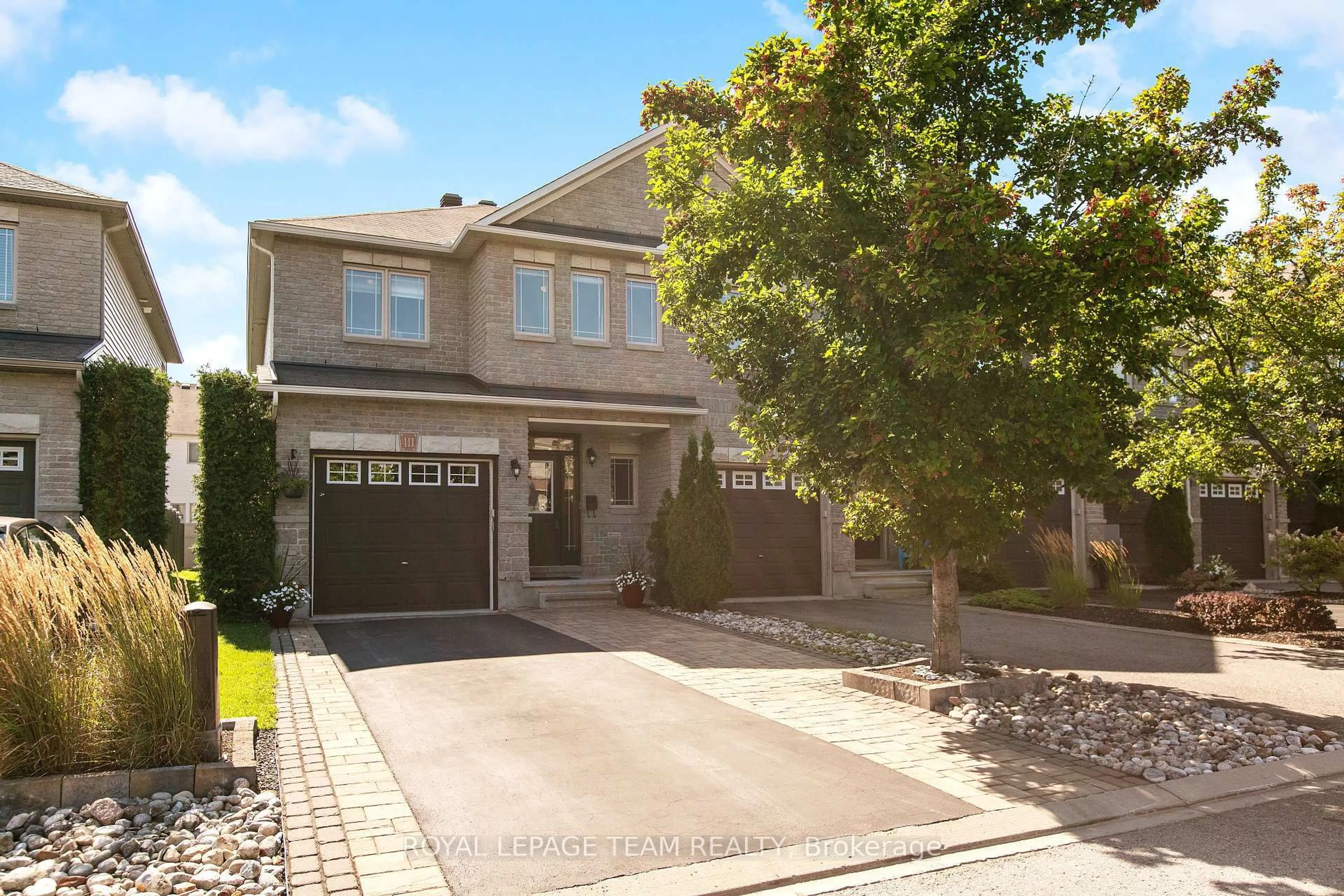 Home with brick exterior material, street for 411 June Crt, Ottawa Ontario K1W 0E3