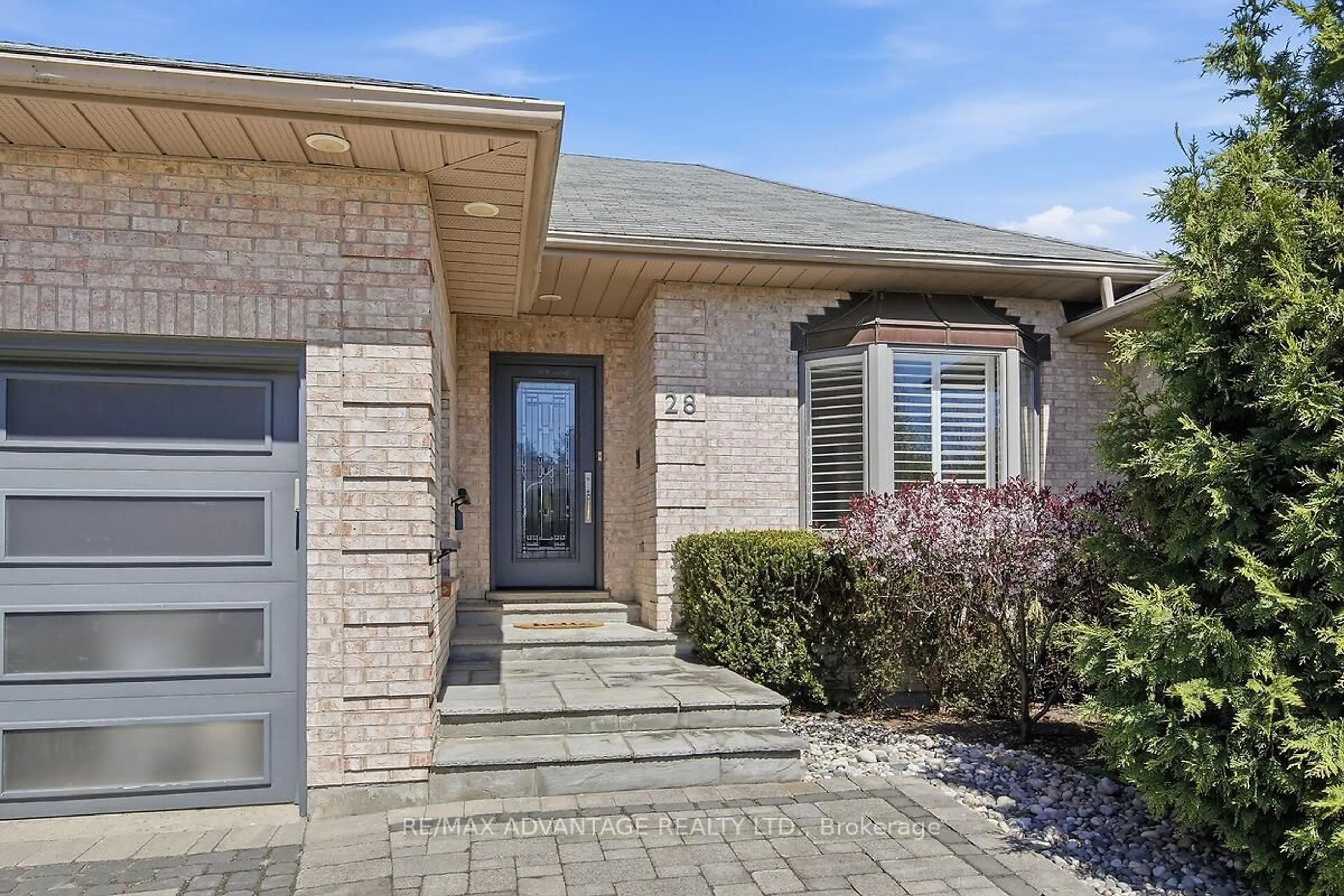 Home with brick exterior material, street for 28 Wynfield Lane, Middlesex Centre Ontario N6H 5L2