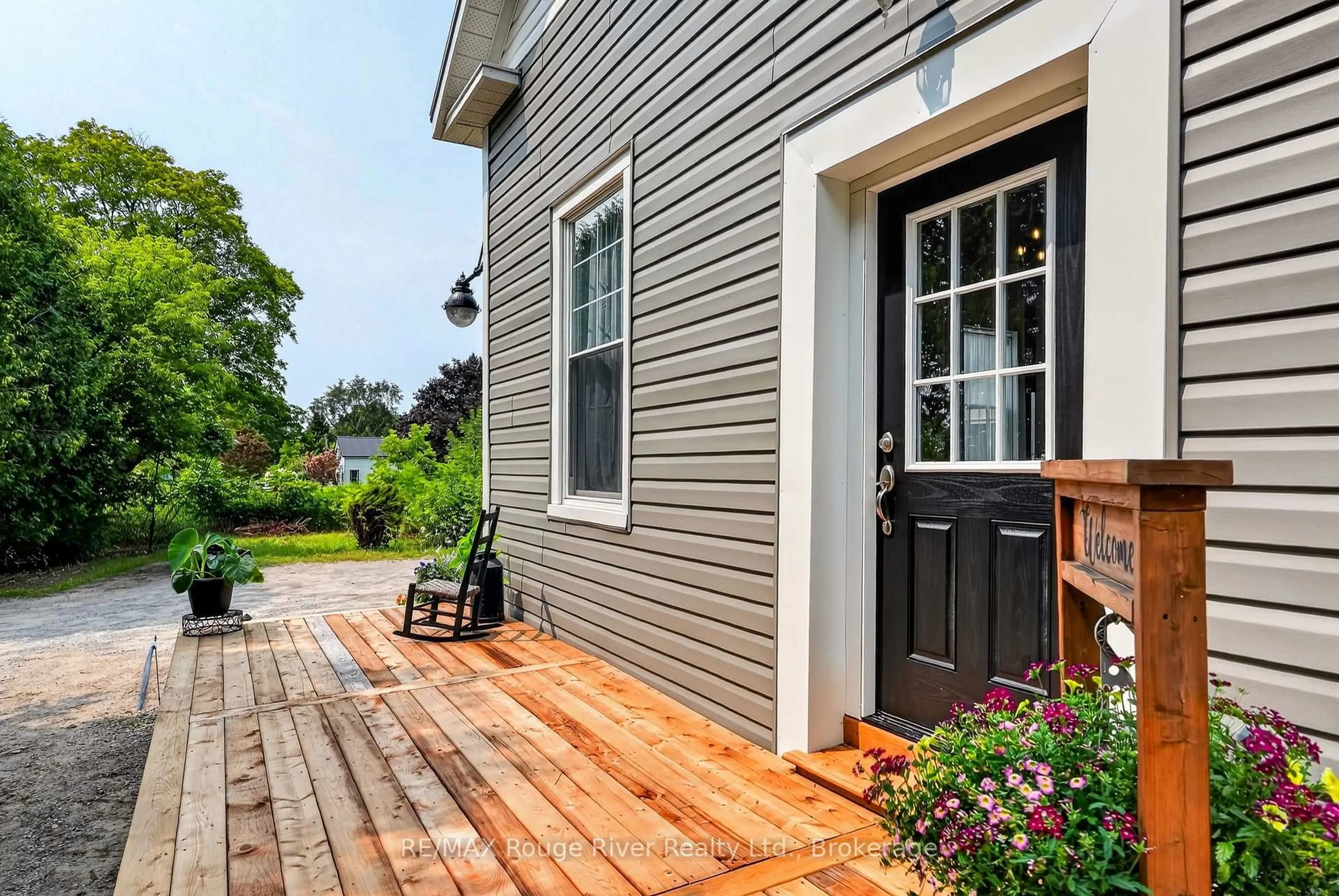 Home with vinyl exterior material, street for 13922 County Road 2 Rd, Cramahe Ontario K0K 1S0