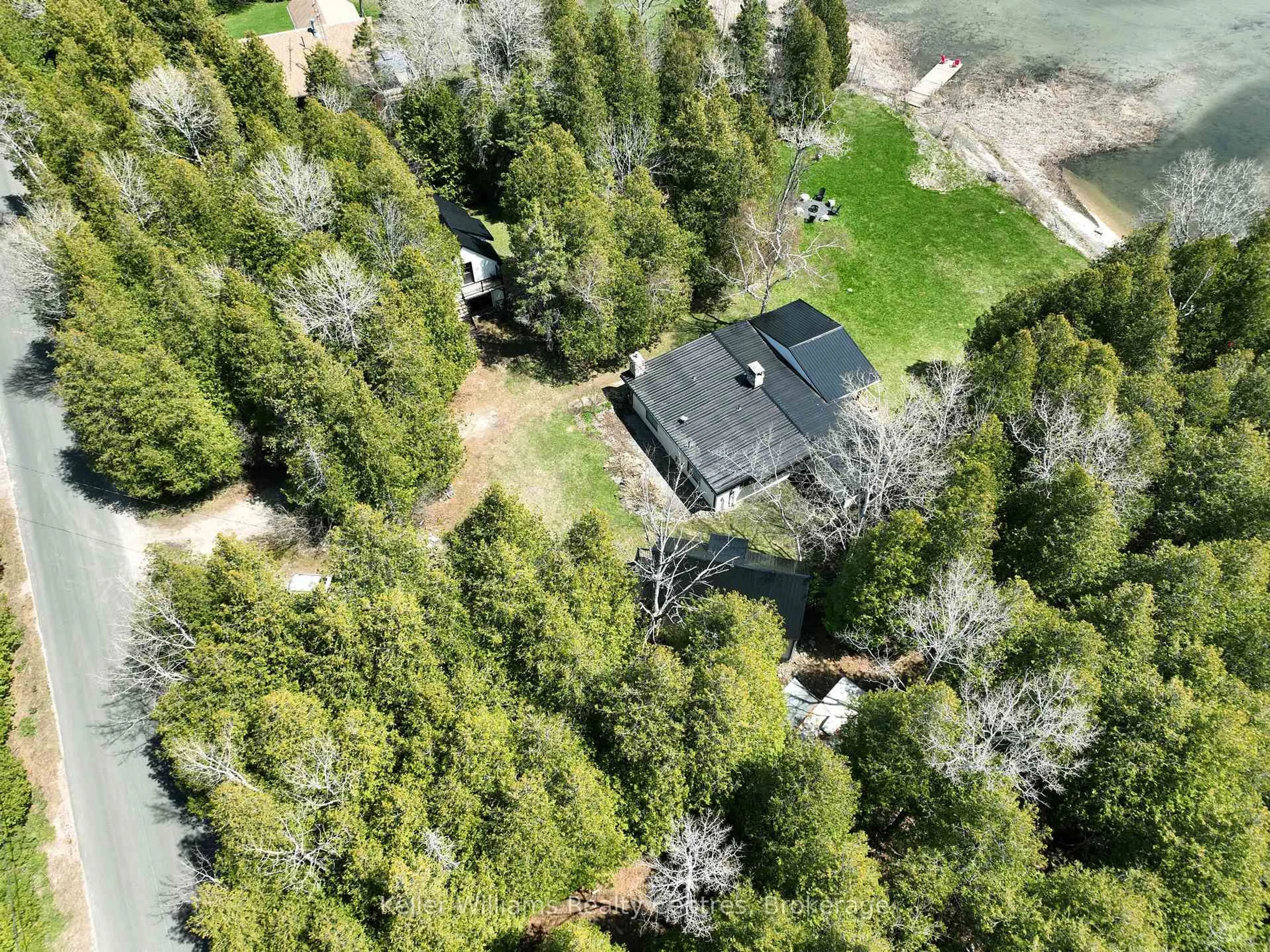A pic from outside/outdoor area/front of a property/back of a property/a pic from drone, forest/trees view for 193 Tamarac Rd, Northern Bruce Peninsula Ontario N0H 1W0