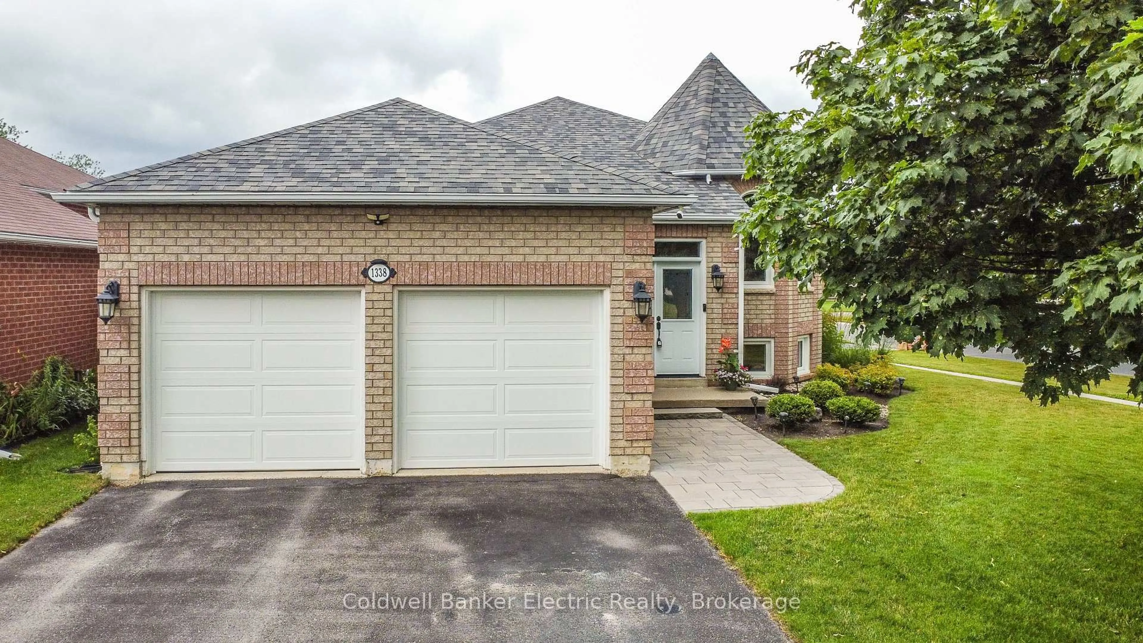 Home with brick exterior material, street for 1338 Wildlark Dr, Peterborough Ontario K9K 2J4