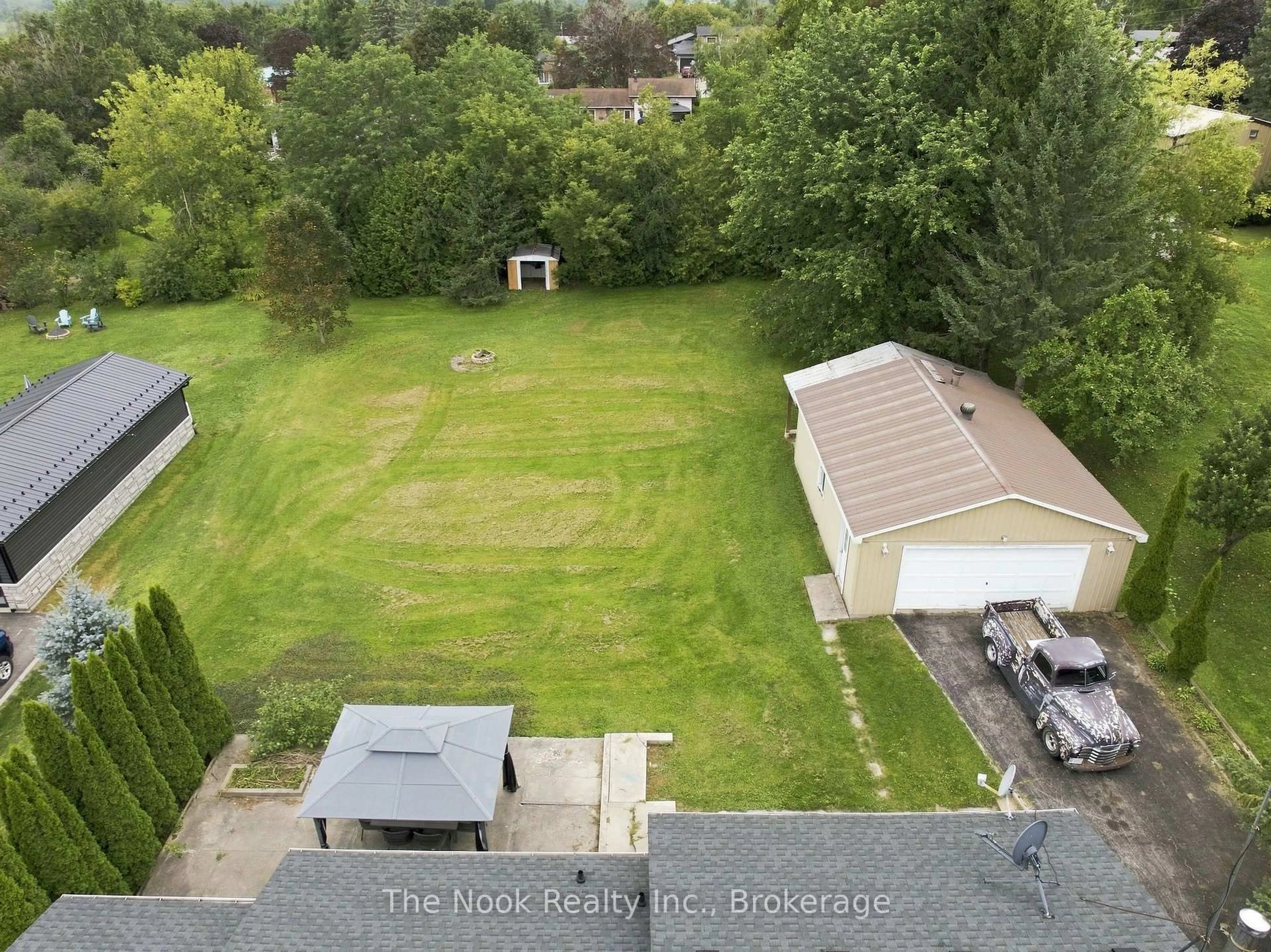 A pic from outside/outdoor area/front of a property/back of a property/a pic from drone, unknown for 24 Cedar Ridge Dr, Kawartha Lakes Ontario L0C 1G0