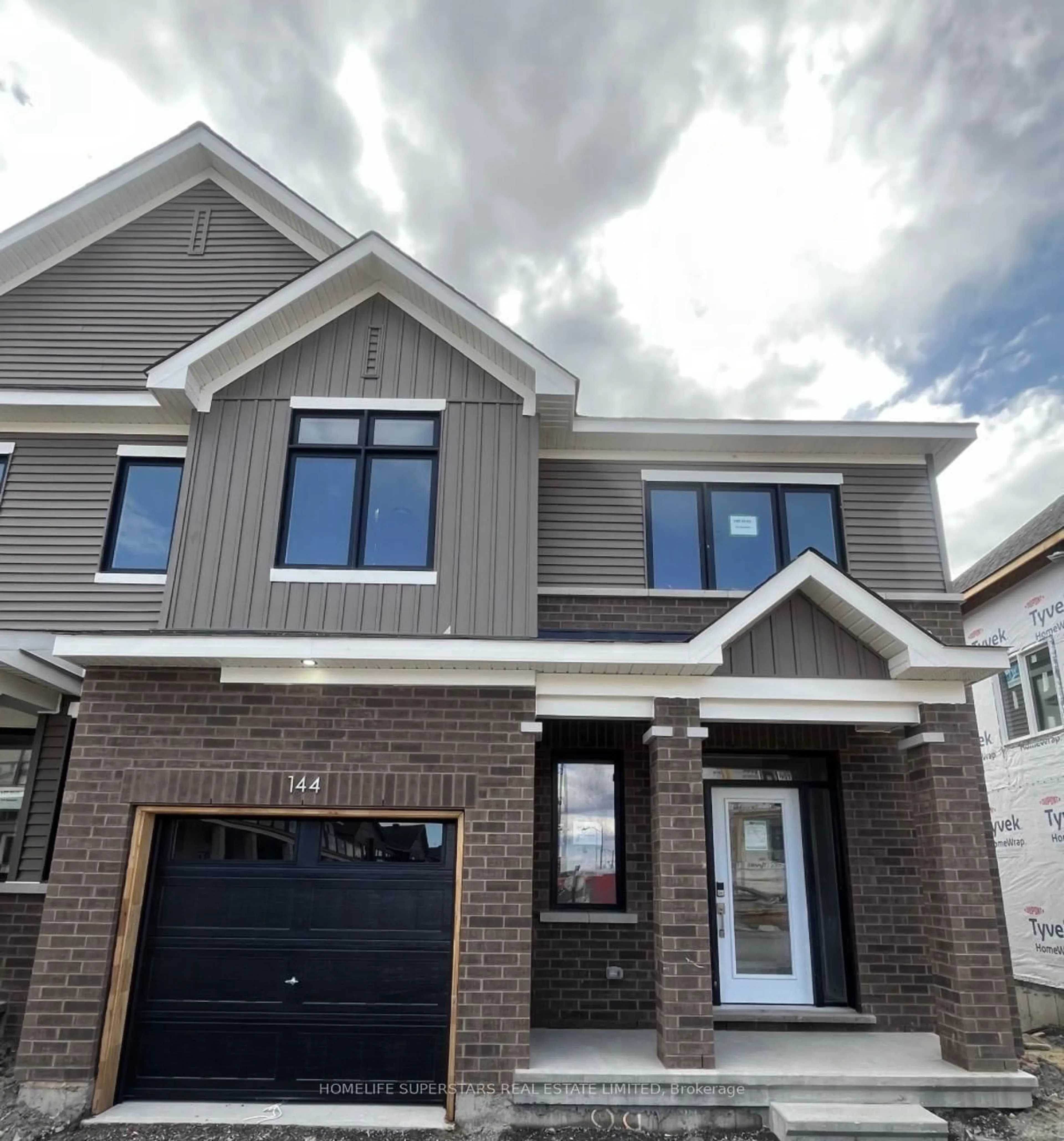 Home with brick exterior material, street for 144 Beebalm Cres, Ottawa Ontario K2J 7G6