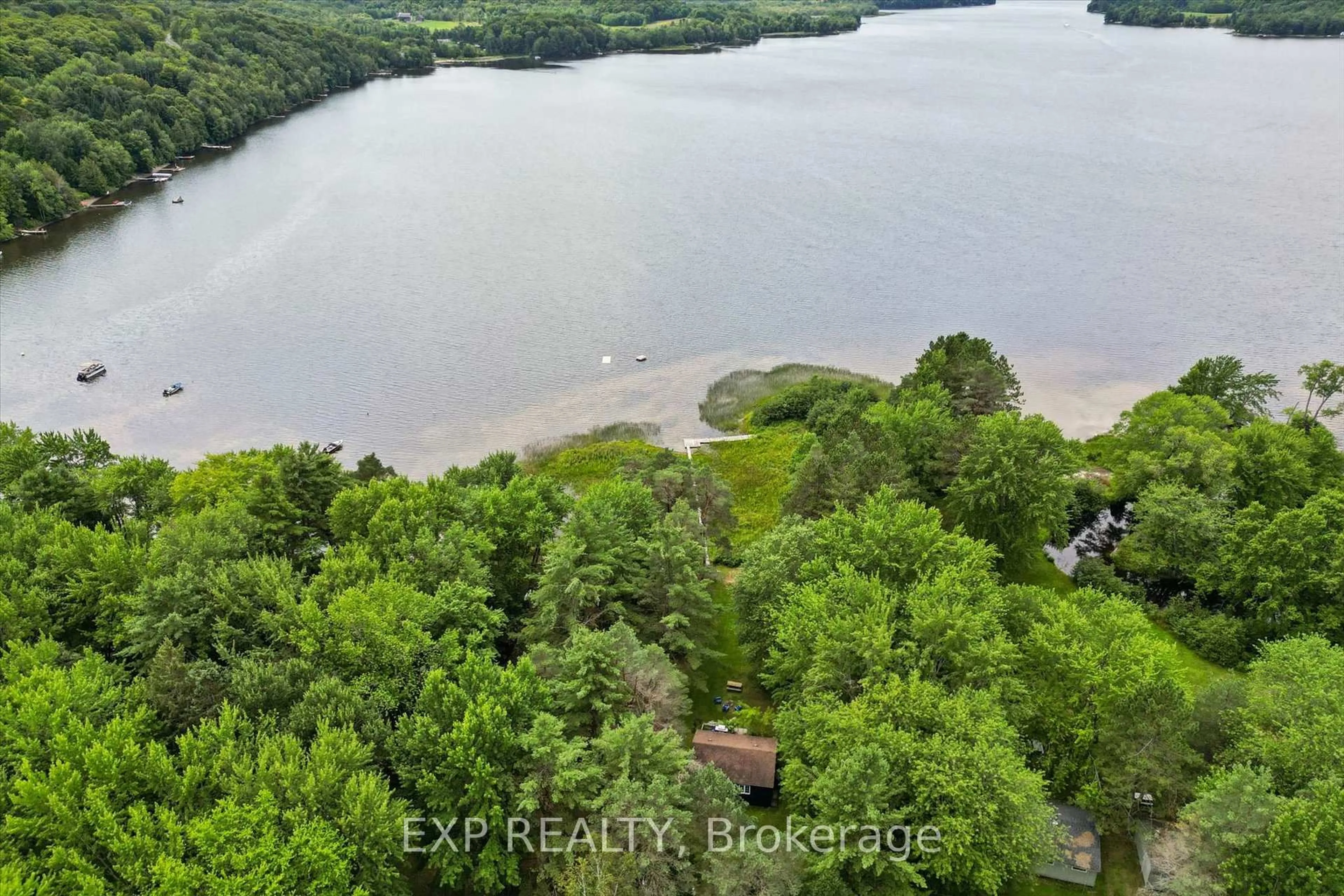 A pic from outside/outdoor area/front of a property/back of a property/a pic from drone, water/lake/river/ocean view for 1039 Wonder Beach Rd, Muskoka Lakes Ontario P0B 1M0