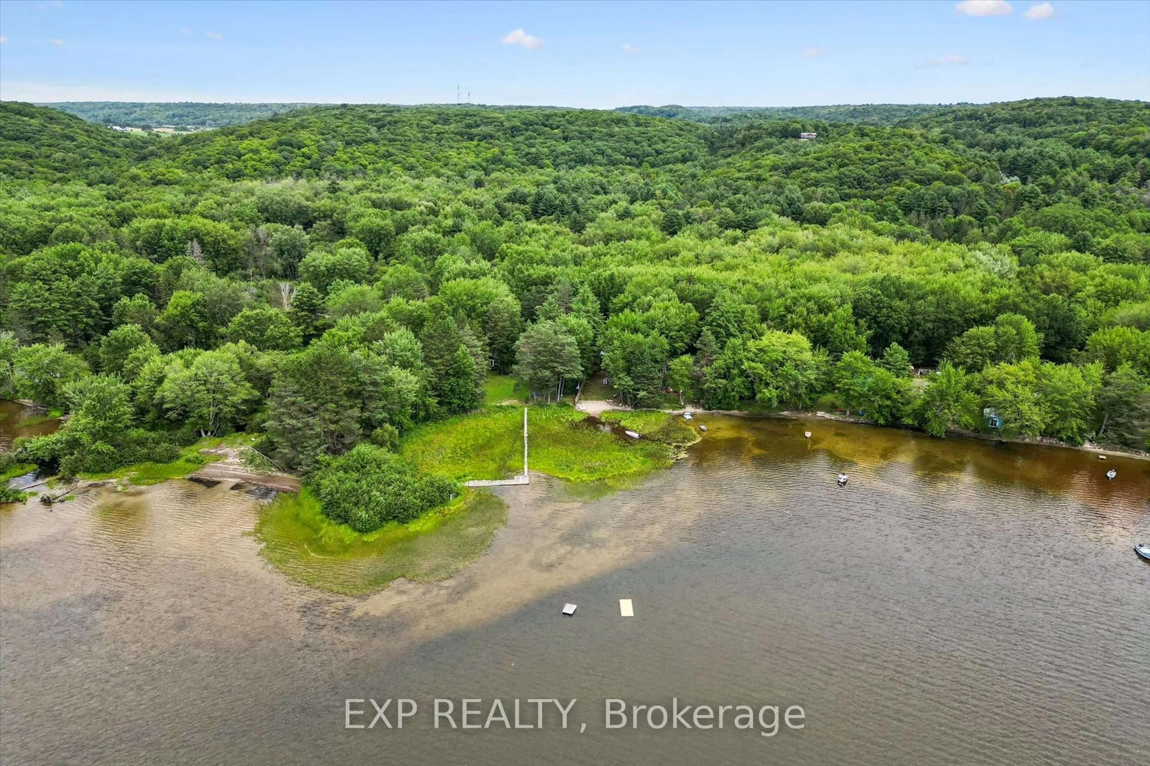 A pic from outside/outdoor area/front of a property/back of a property/a pic from drone, water/lake/river/ocean view for 1039 Wonder Beach Rd, Muskoka Lakes Ontario P0B 1M0