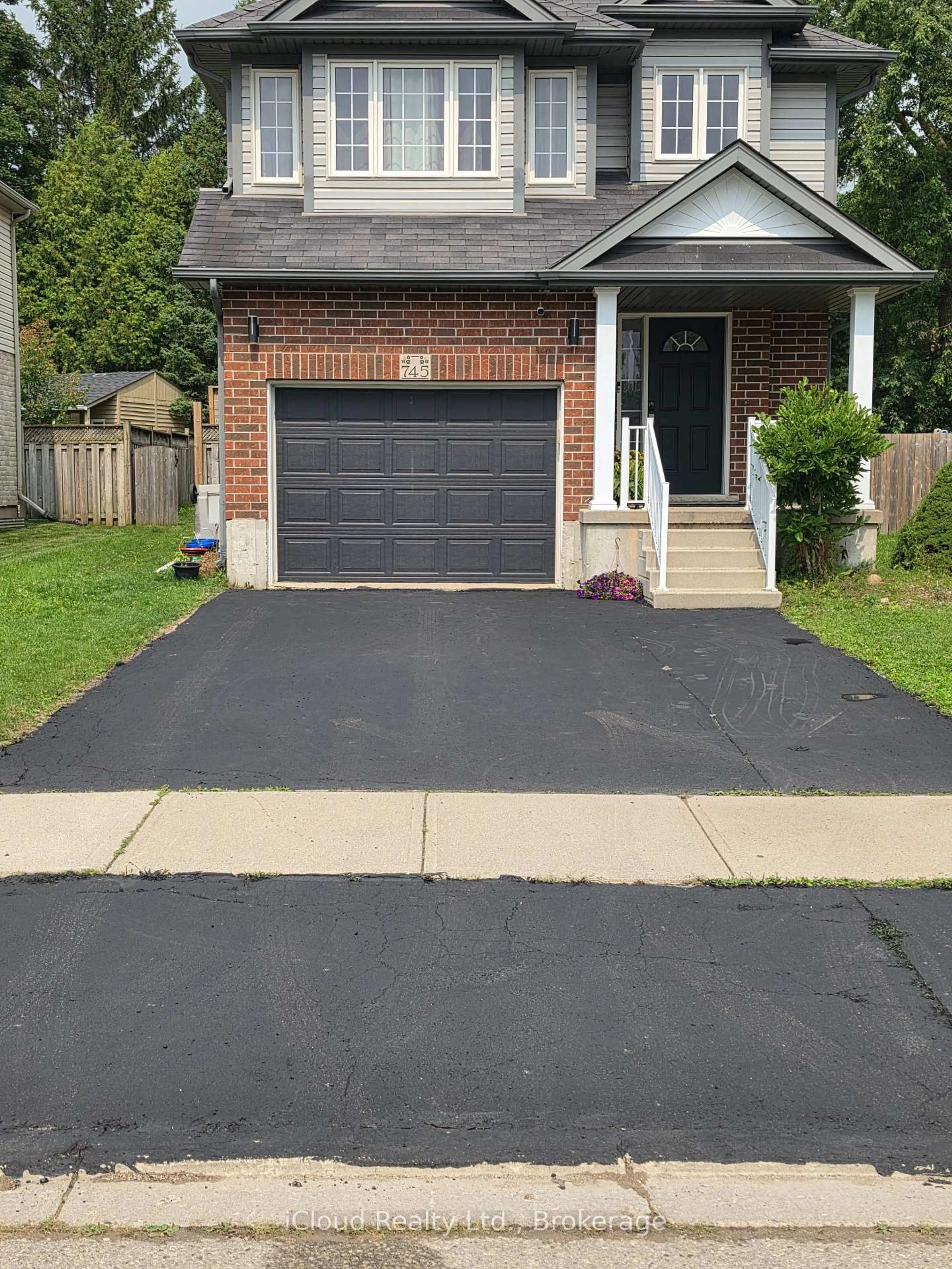 Home with vinyl exterior material, street for 745 Reid Cres, North Perth Ontario N4W 0A2
