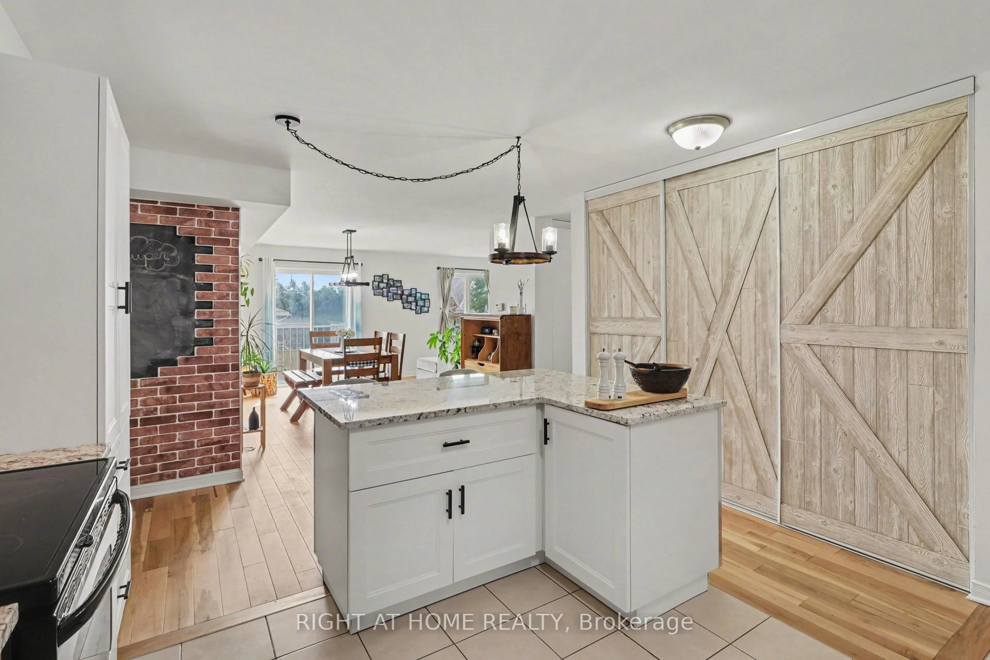 Open concept kitchen, ceramic/tile floor for 646 Cummings Ave #202, Ottawa Ontario K1K 2K6