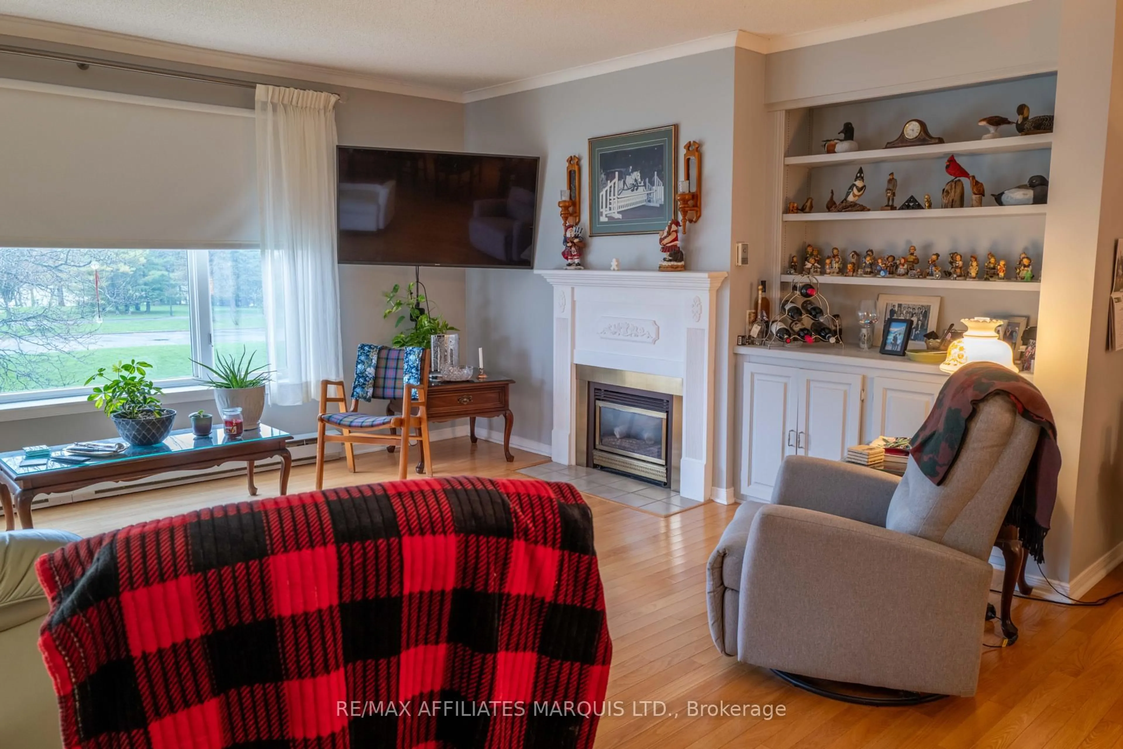 Living room with furniture, wood/laminate floor for 121 Water St #312, Cornwall Ontario K6J 5T8