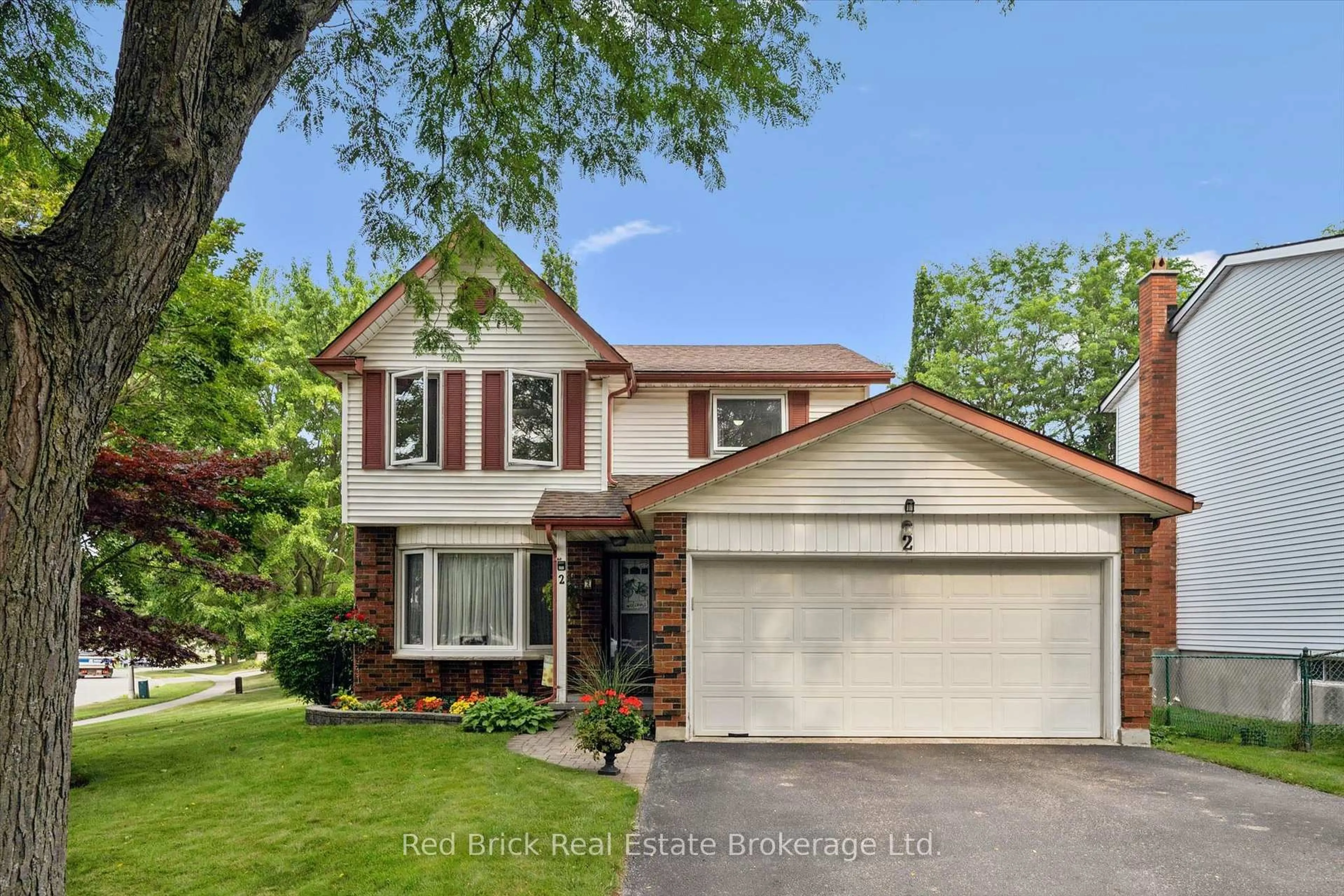Home with vinyl exterior material, street for 2 Woodborough Rd, Guelph Ontario N1G 3K5
