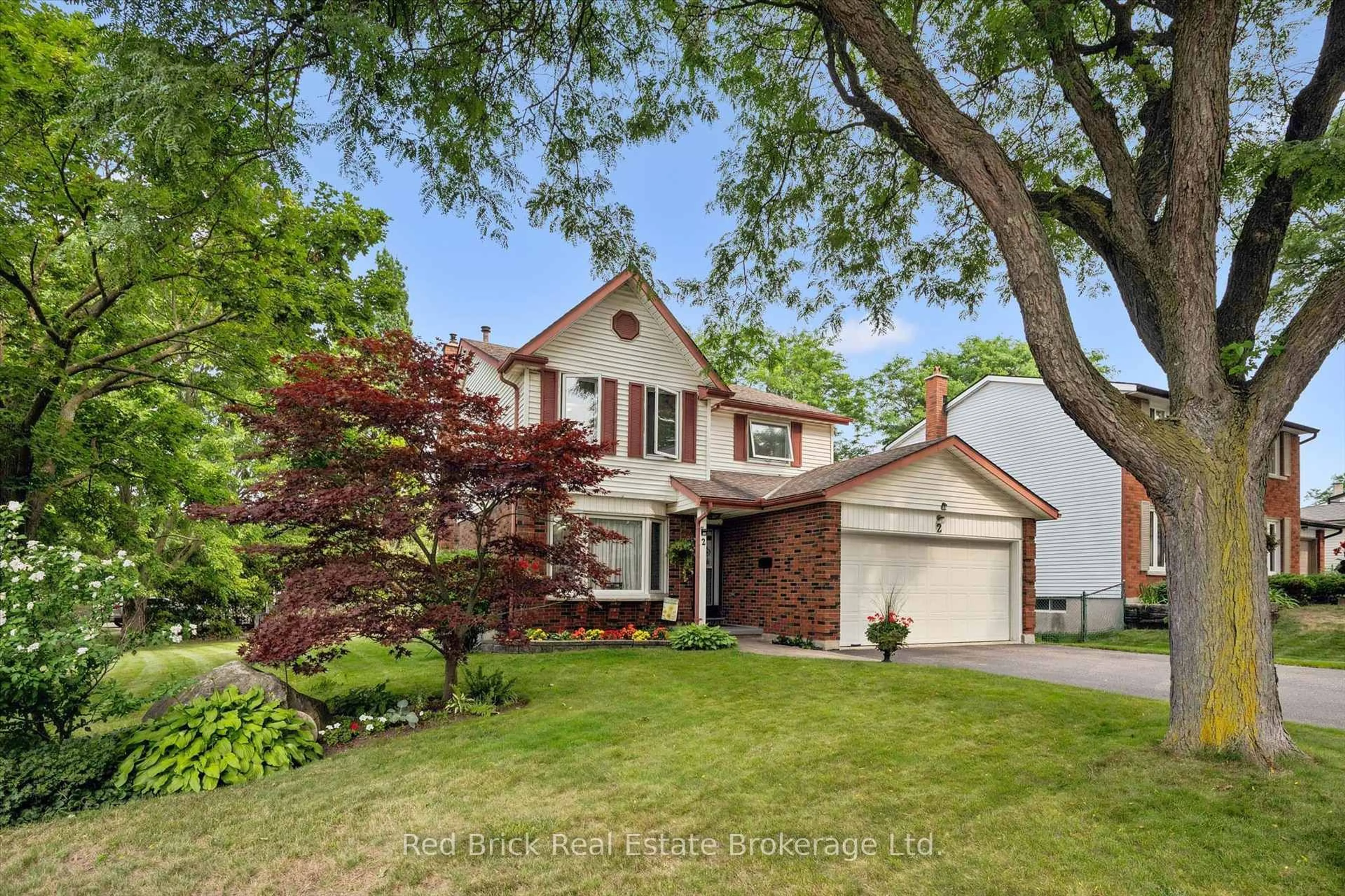 Home with brick exterior material, street for 2 Woodborough Rd, Guelph Ontario N1G 3K5
