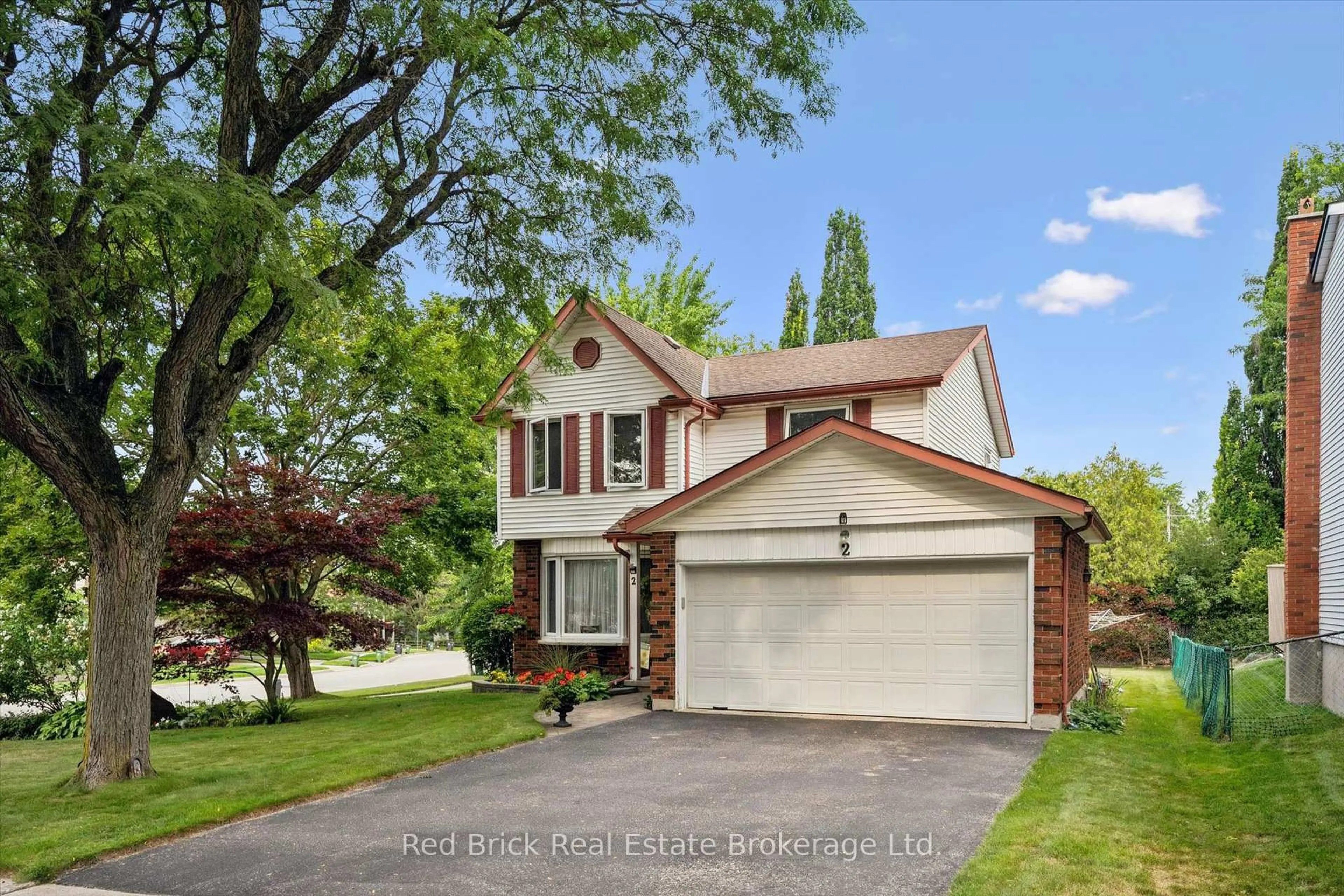 Home with vinyl exterior material, street for 2 Woodborough Rd, Guelph Ontario N1G 3K5