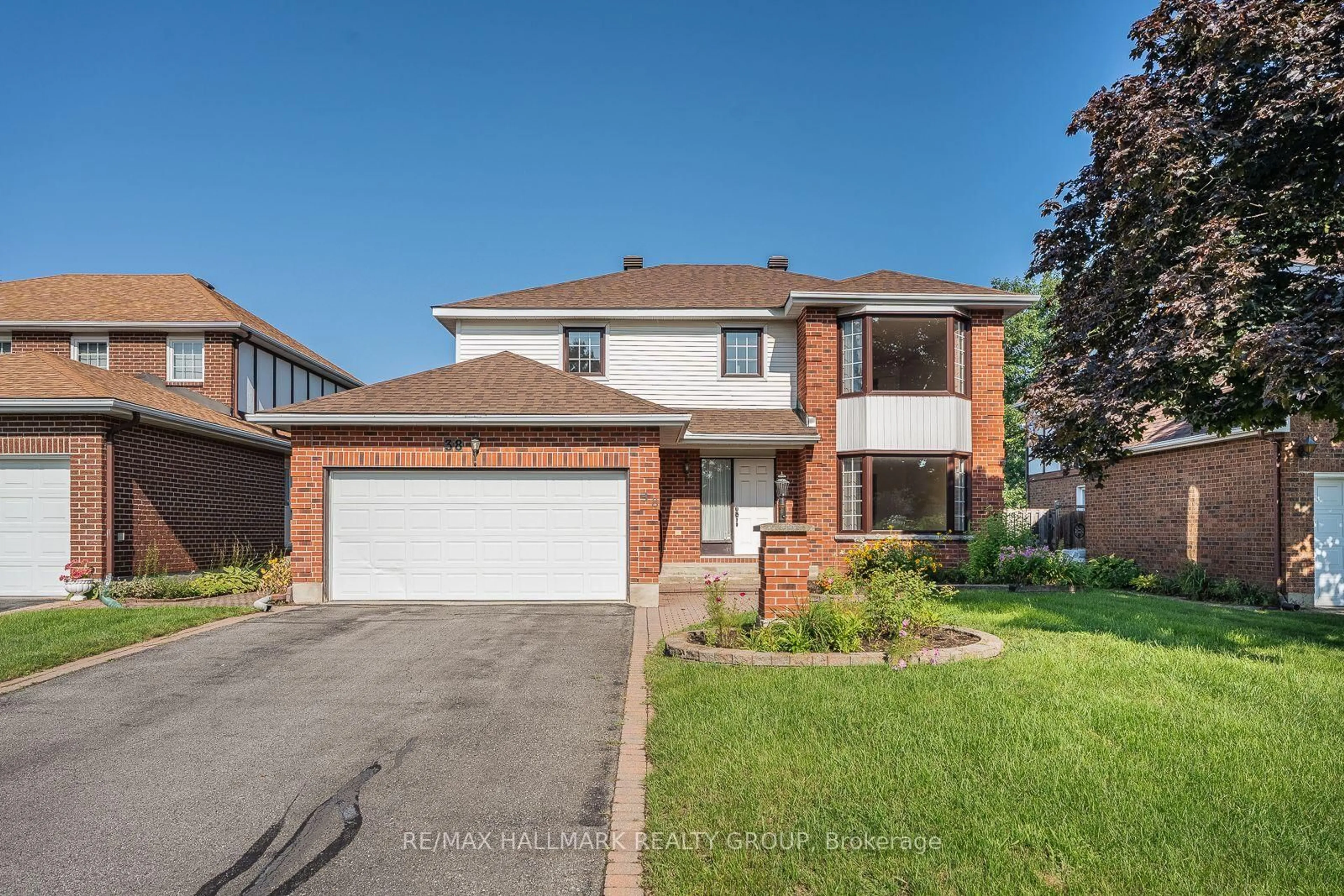 Home with brick exterior material, street for 38 Bateman Dr, Ottawa Ontario K2G 5H4