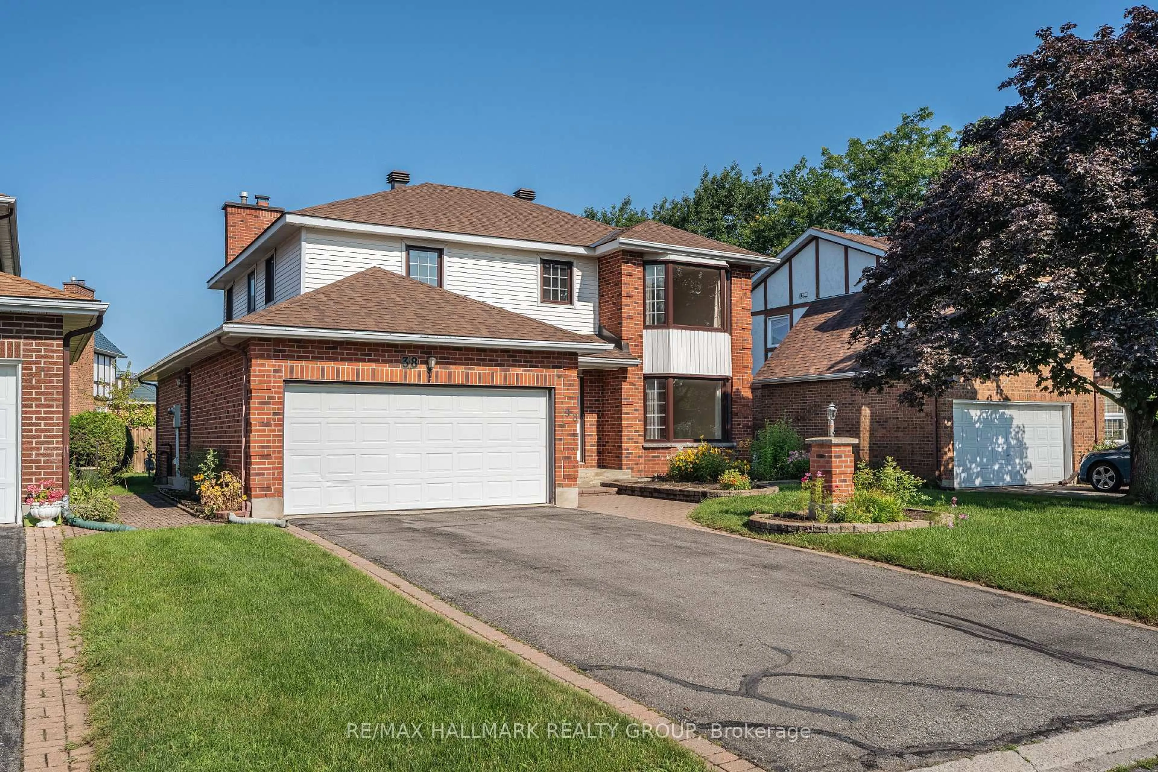 Home with brick exterior material, street for 38 Bateman Dr, Ottawa Ontario K2G 5H4