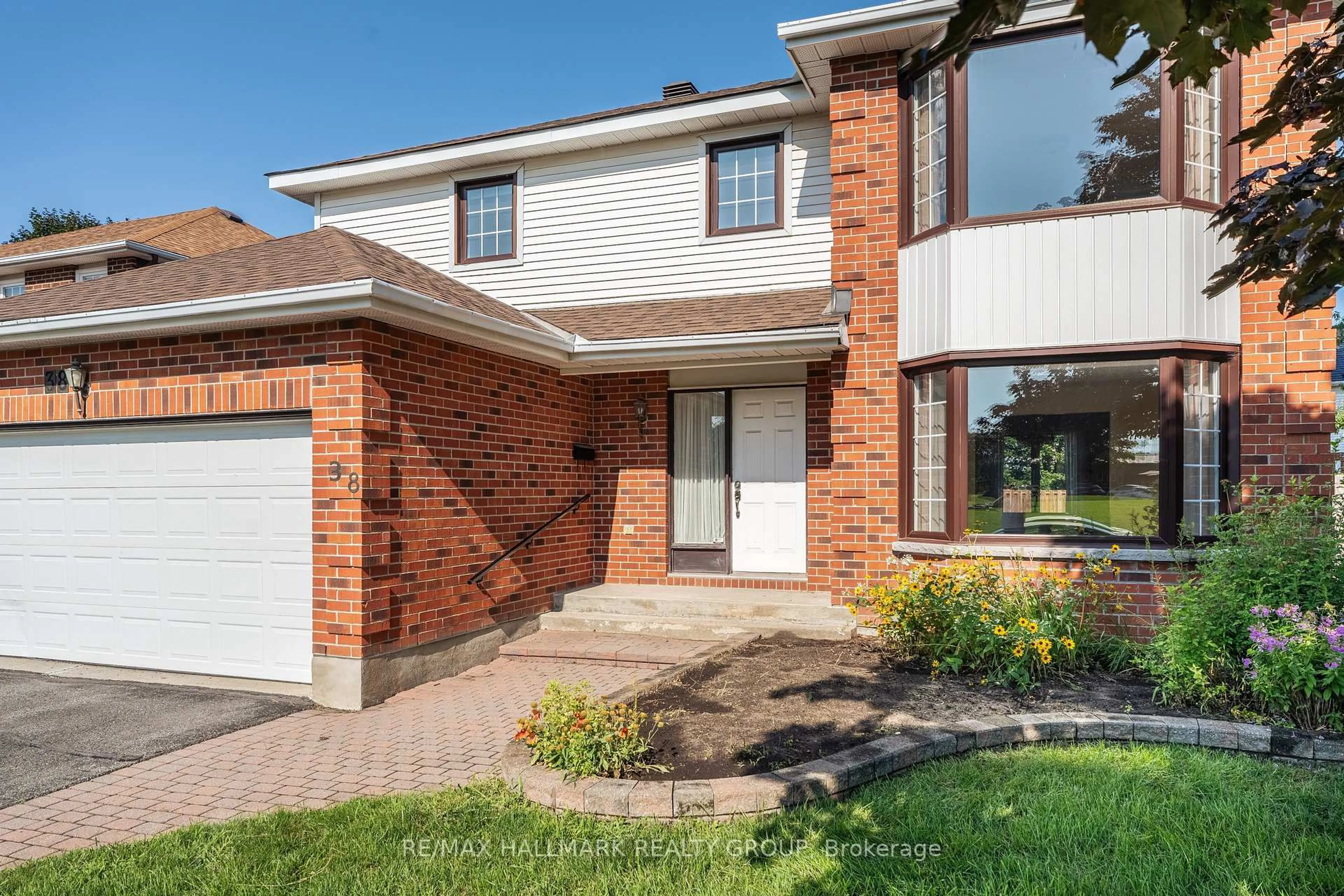 Home with brick exterior material, street for 38 Bateman Dr, Ottawa Ontario K2G 5H4