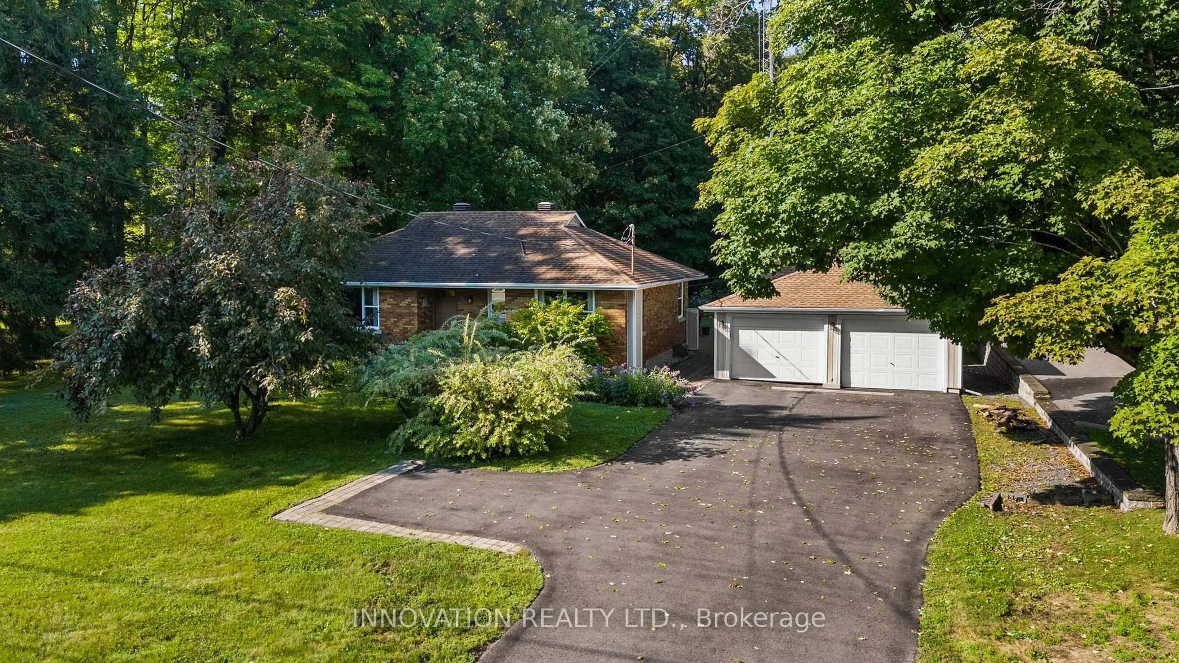A pic from outside/outdoor area/front of a property/back of a property/a pic from drone, street for 3885 Carp Rd, Carp Ontario K0A 1L0
