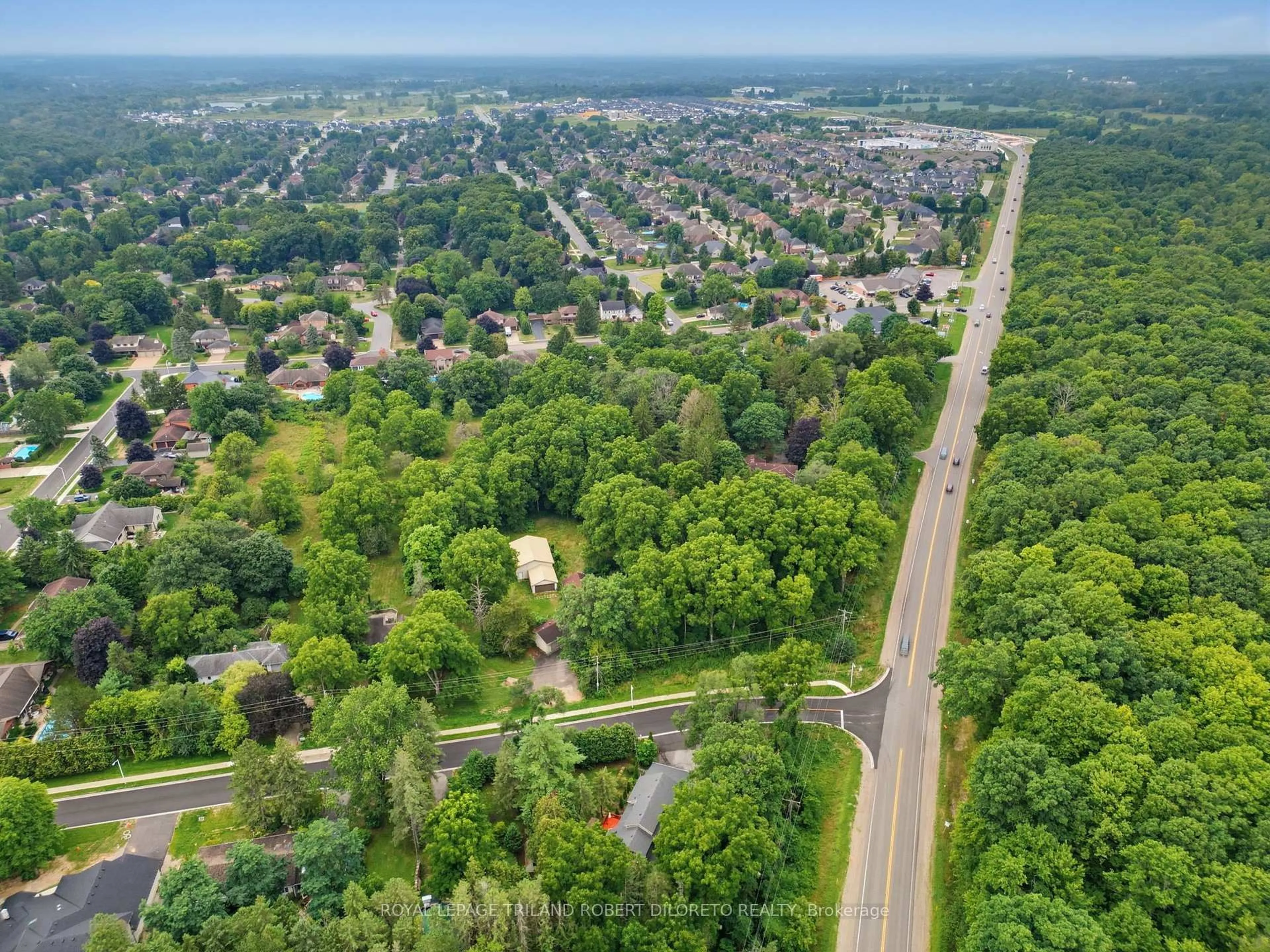 A pic from outside/outdoor area/front of a property/back of a property/a pic from drone, street for 7 Elmhurst St, Middlesex Centre Ontario N0L 1R0