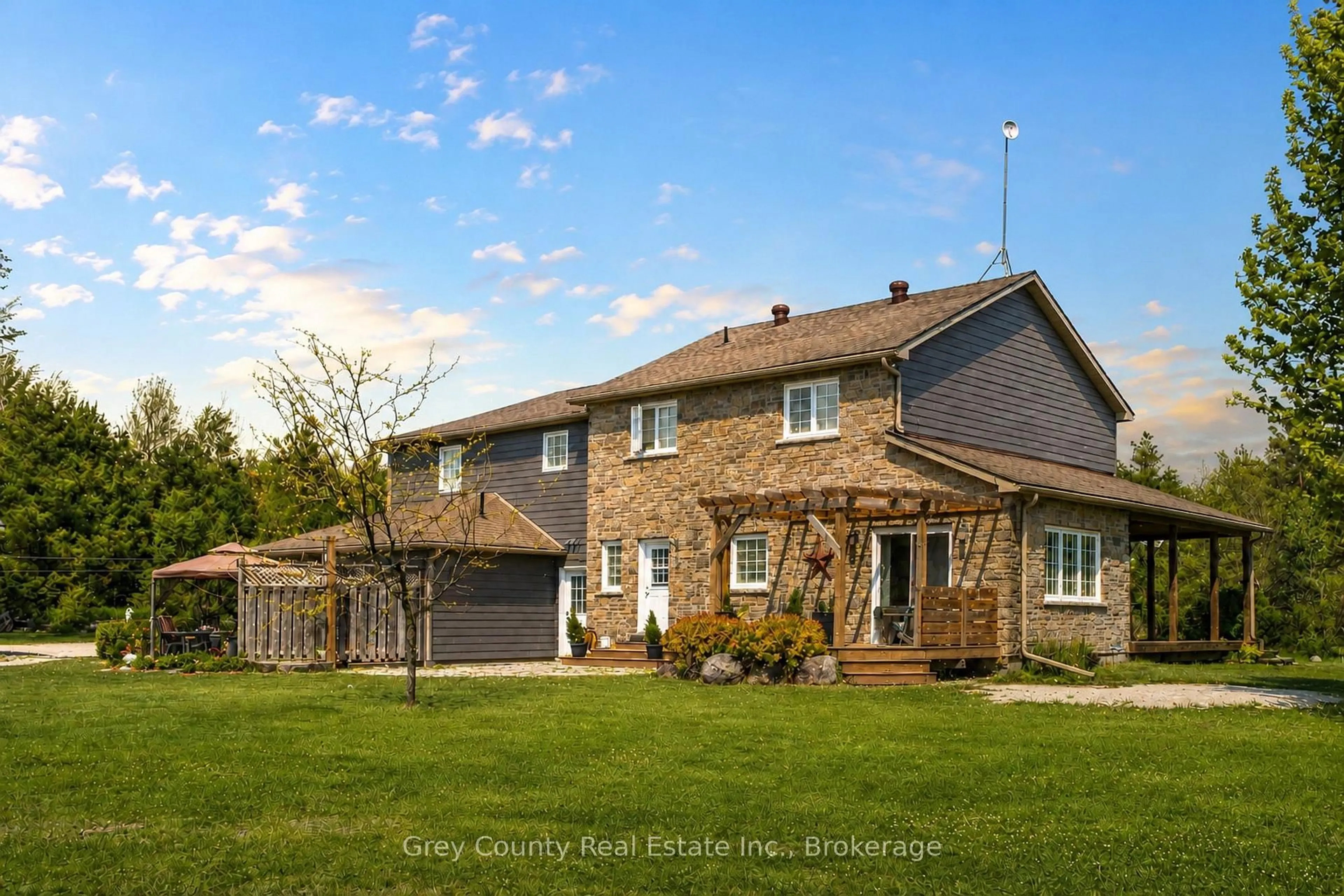 A pic from outside/outdoor area/front of a property/back of a property/a pic from drone, street for 135260 9th Line, Grey Highlands Ontario N0C 1H0