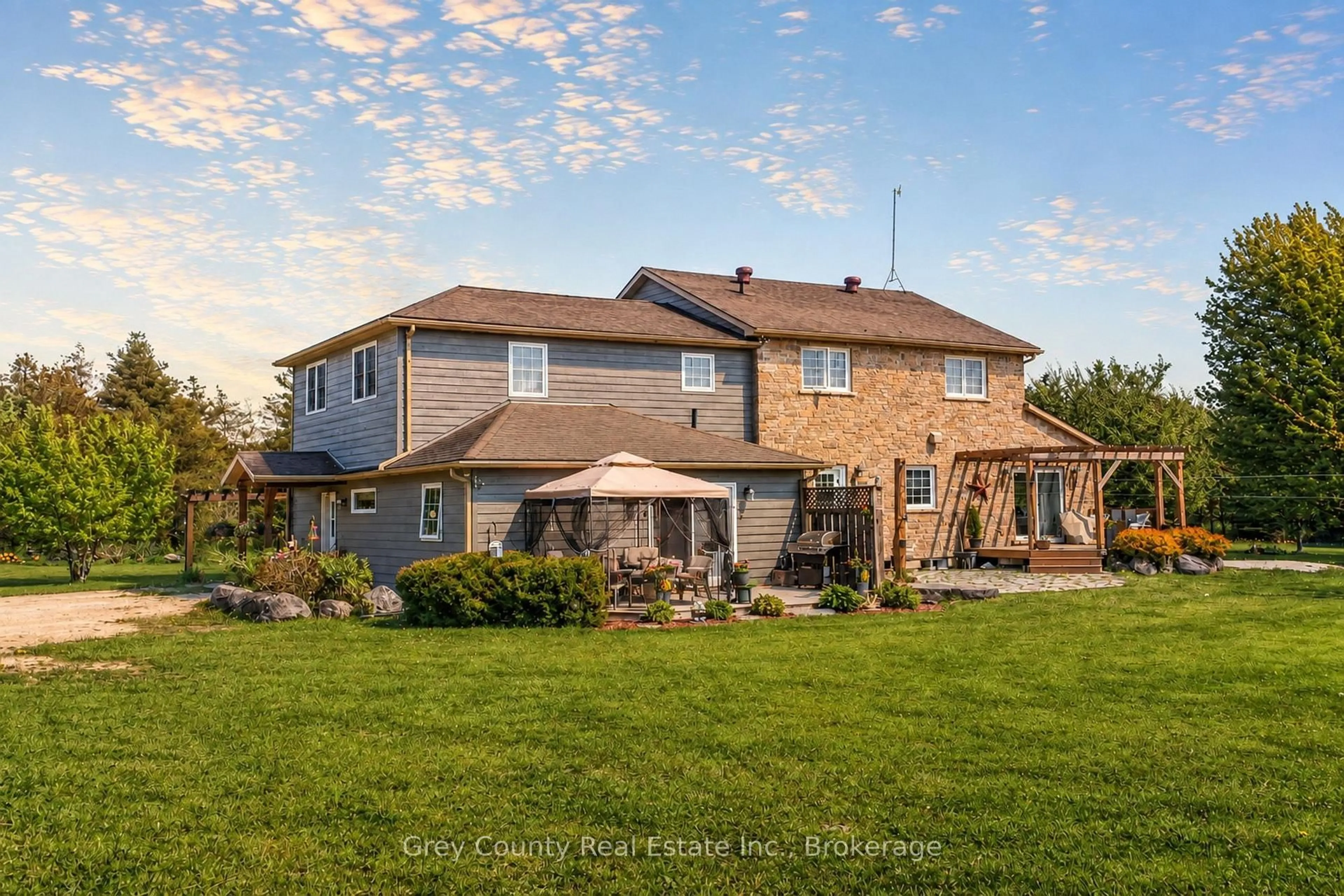 A pic from outside/outdoor area/front of a property/back of a property/a pic from drone, unknown for 135260 9th Line, Grey Highlands Ontario N0C 1H0