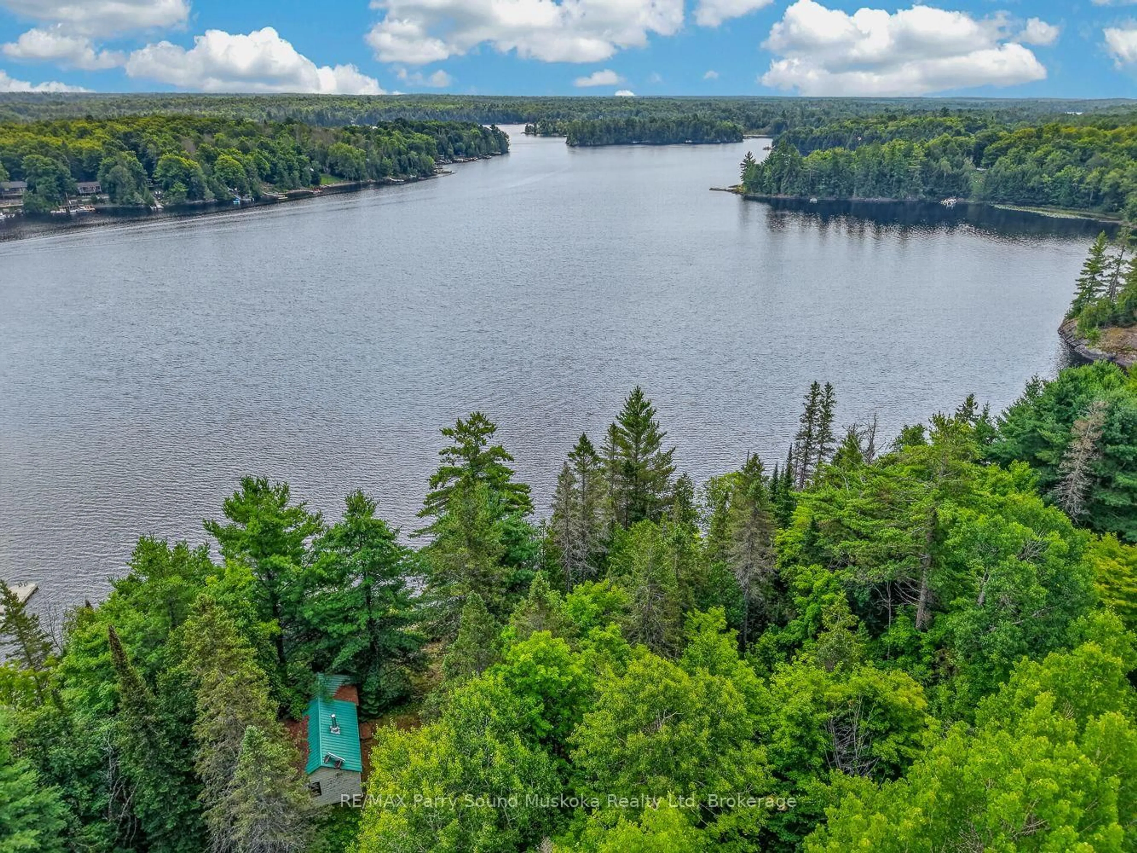 A pic from outside/outdoor area/front of a property/back of a property/a pic from drone, water/lake/river/ocean view for 418 Whitestone Lk Rd, Whitestone Ontario P0A 1G0