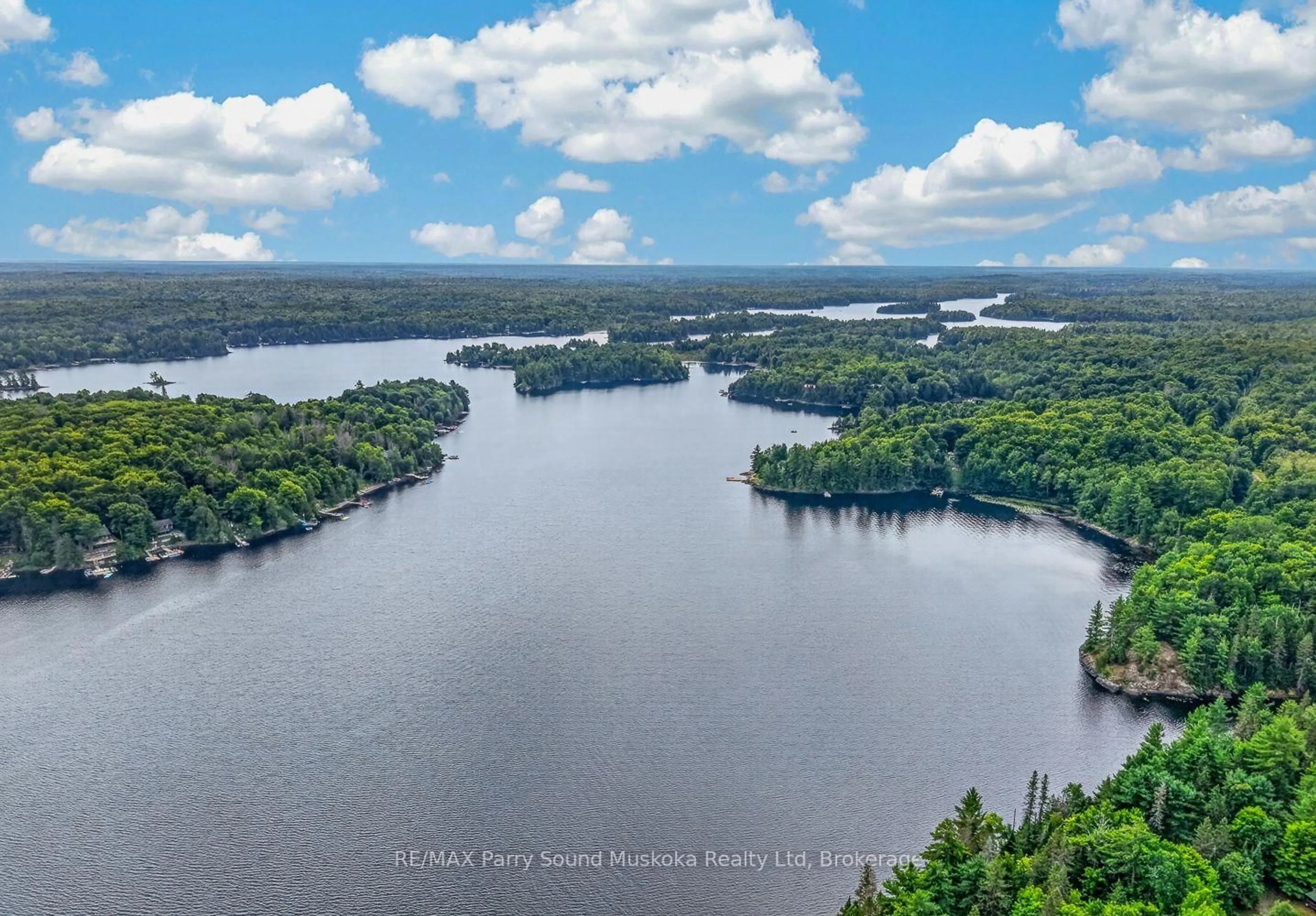 A pic from outside/outdoor area/front of a property/back of a property/a pic from drone, water/lake/river/ocean view for 418 Whitestone Lk Rd, Whitestone Ontario P0A 1G0