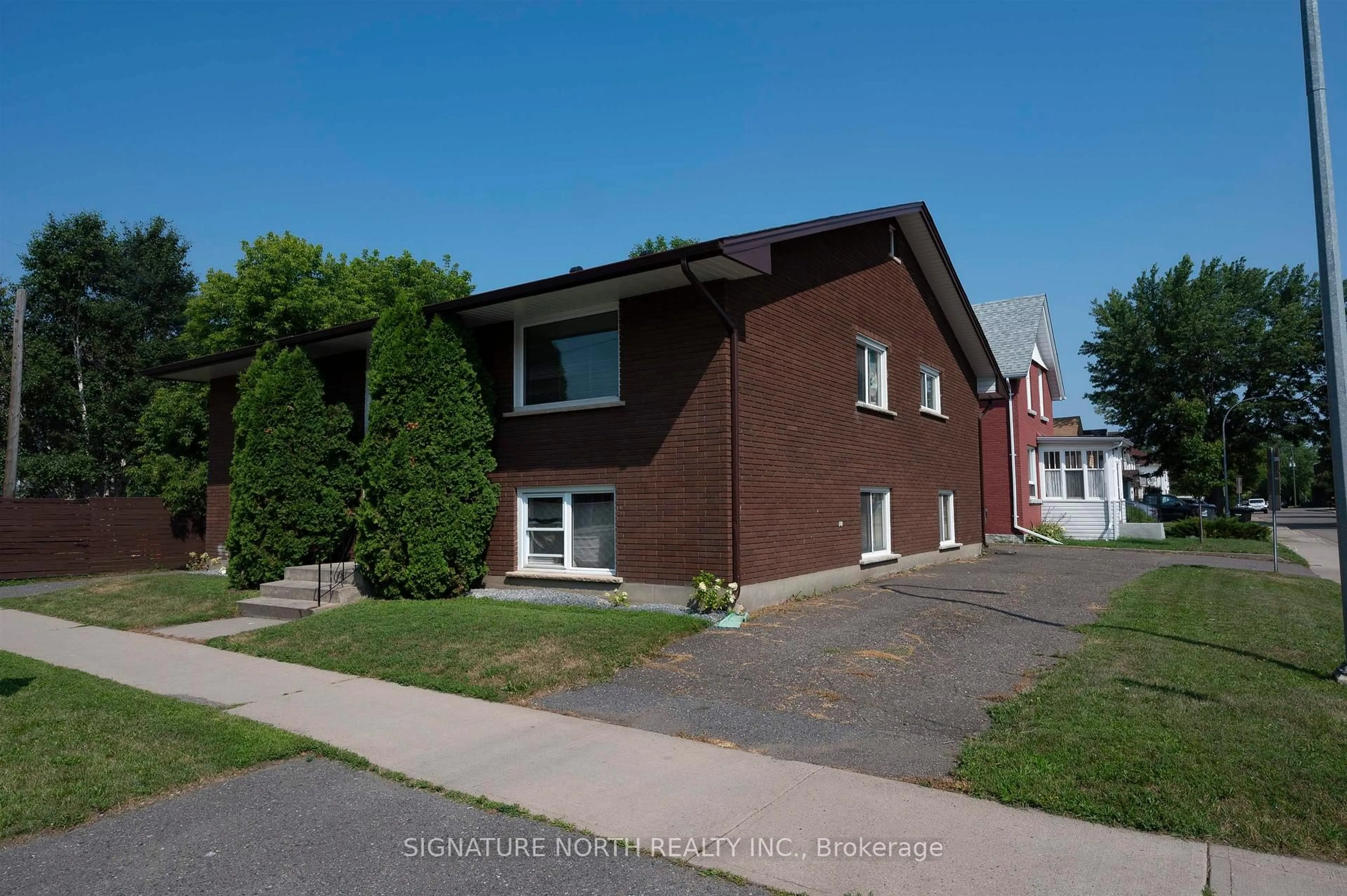 Home with brick exterior material, street for 1103 Donald Street East, Thunder Bay Ontario P7E 5V9