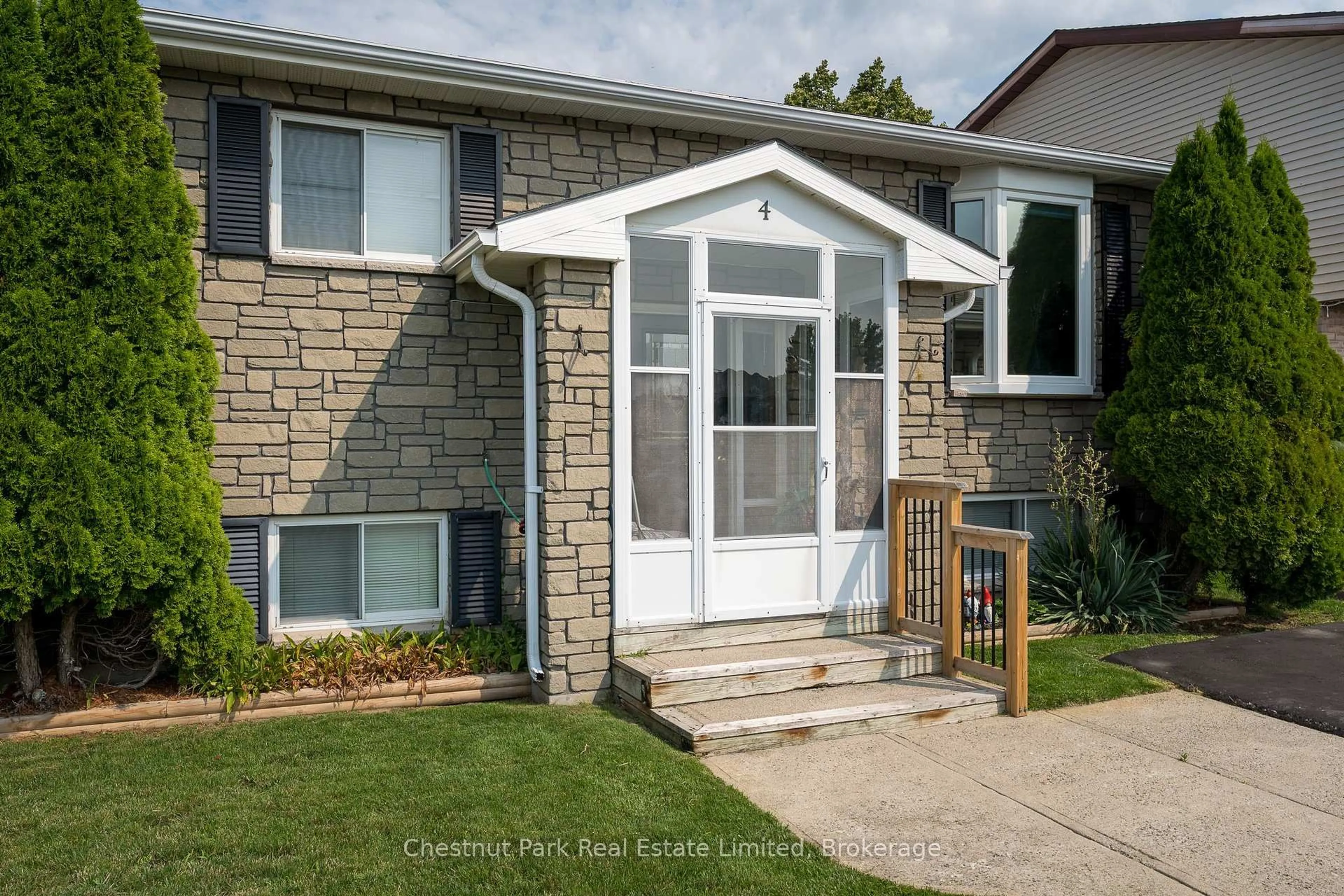 Home with vinyl exterior material, street for 4 First Ave, Prince Edward County Ontario K0K 3L0