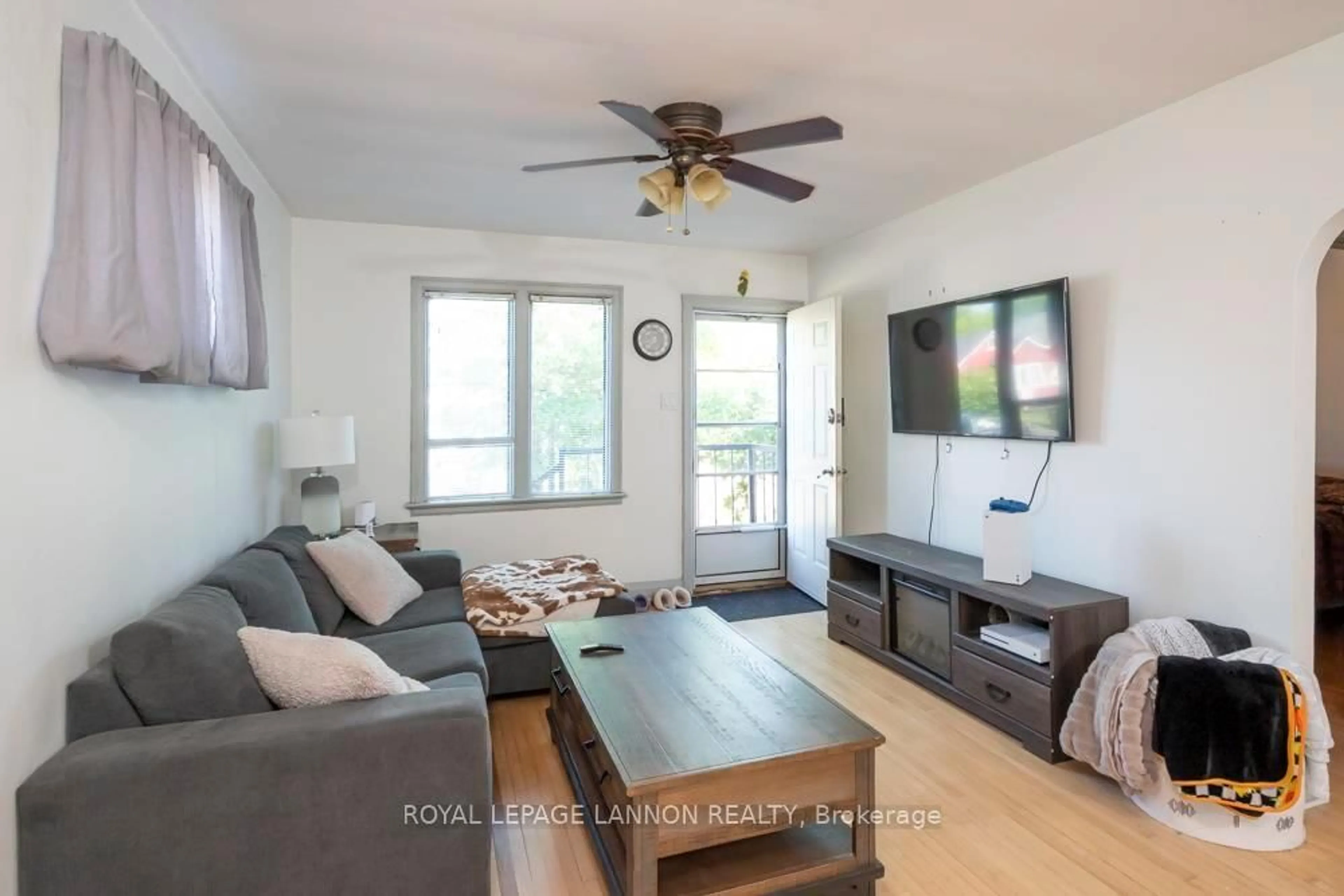 Living room with furniture, wood/laminate floor for 185 Empress St S, Thunder Bay Ontario P7B 4N8