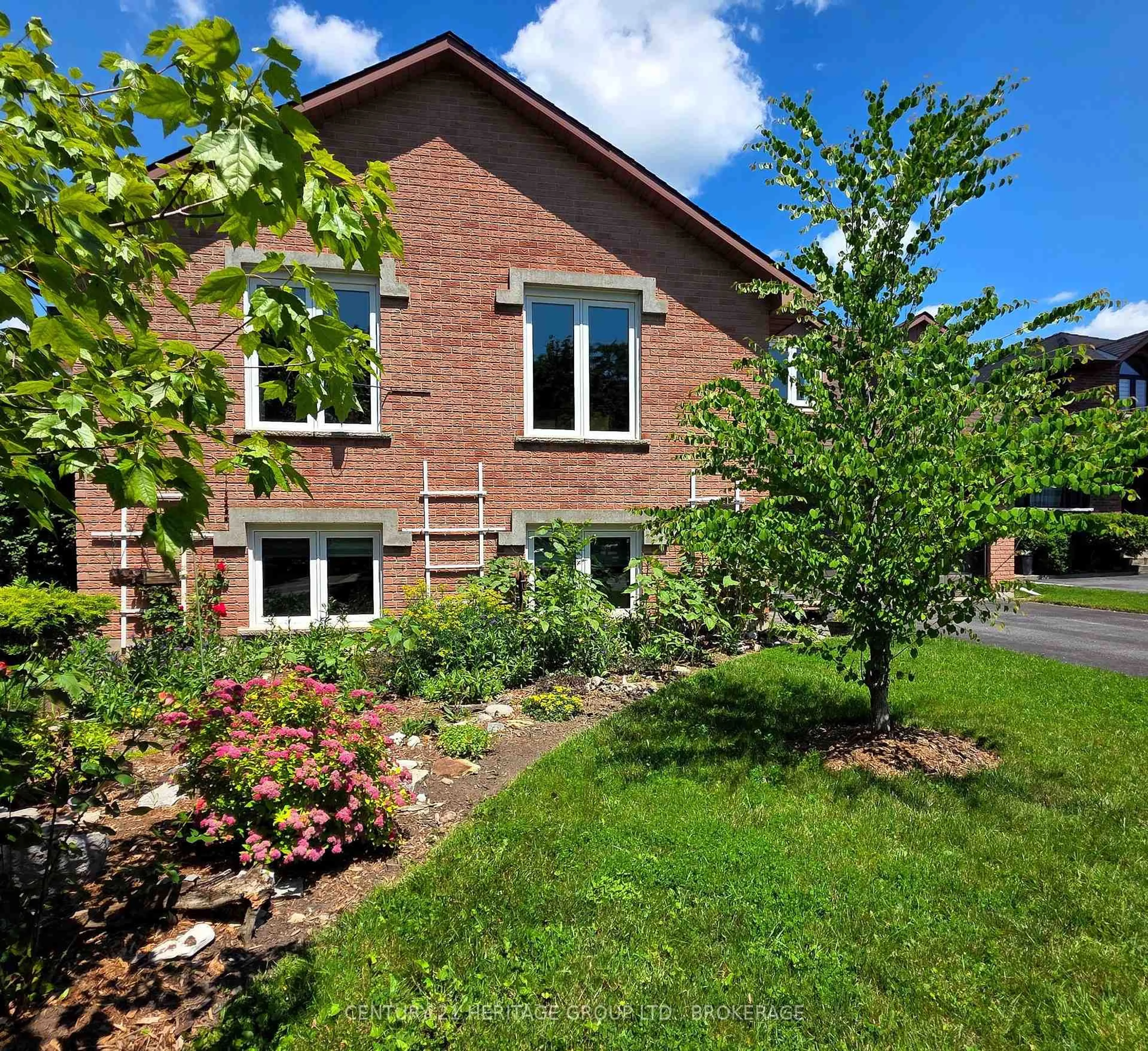 Home with brick exterior material, street for 23 Old Oak Rd, Kingston Ontario K7M 7C3
