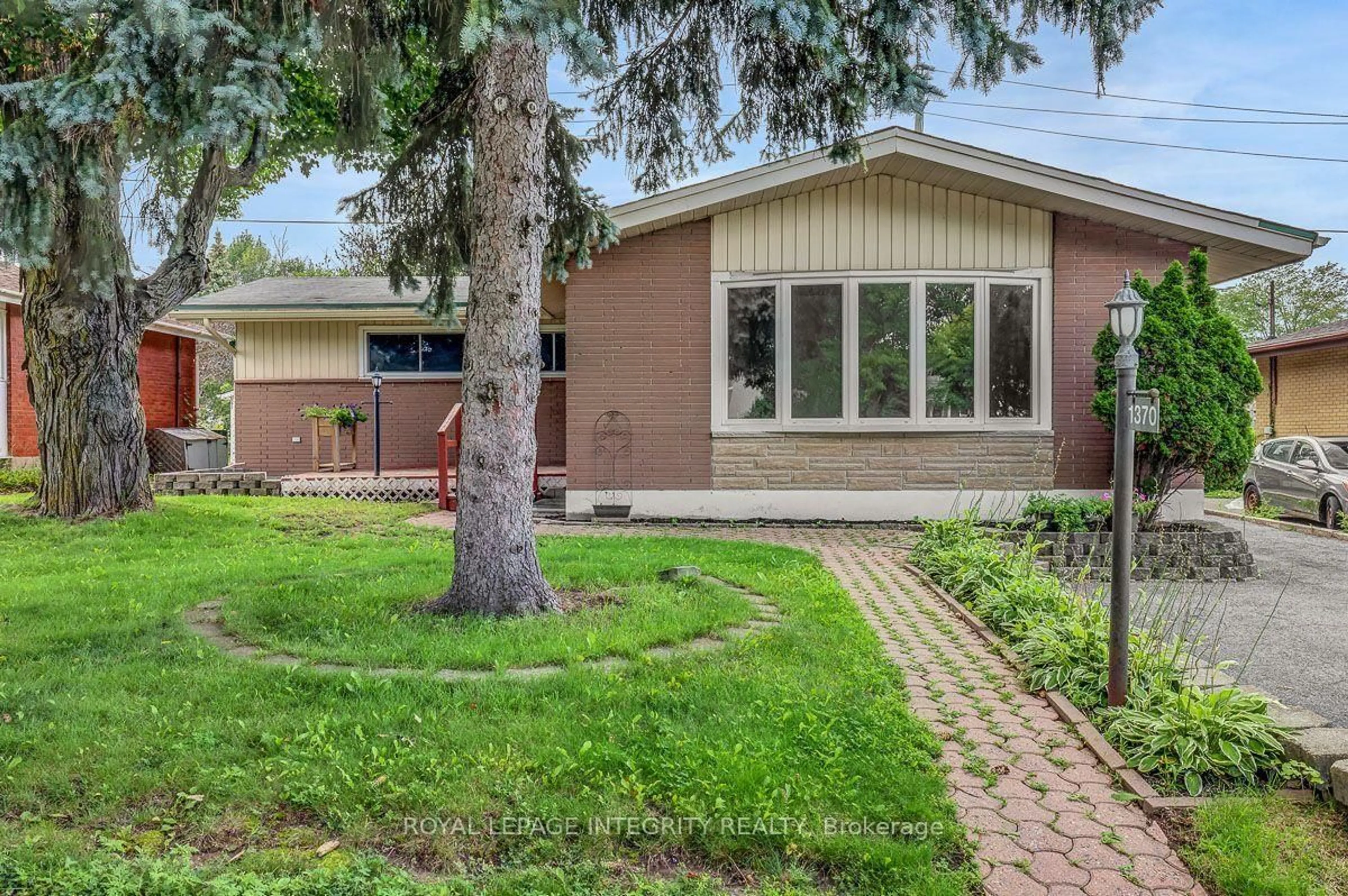 Home with brick exterior material, street for 1370 Highgate Rd, Ottawa Ontario K2C 2Y6