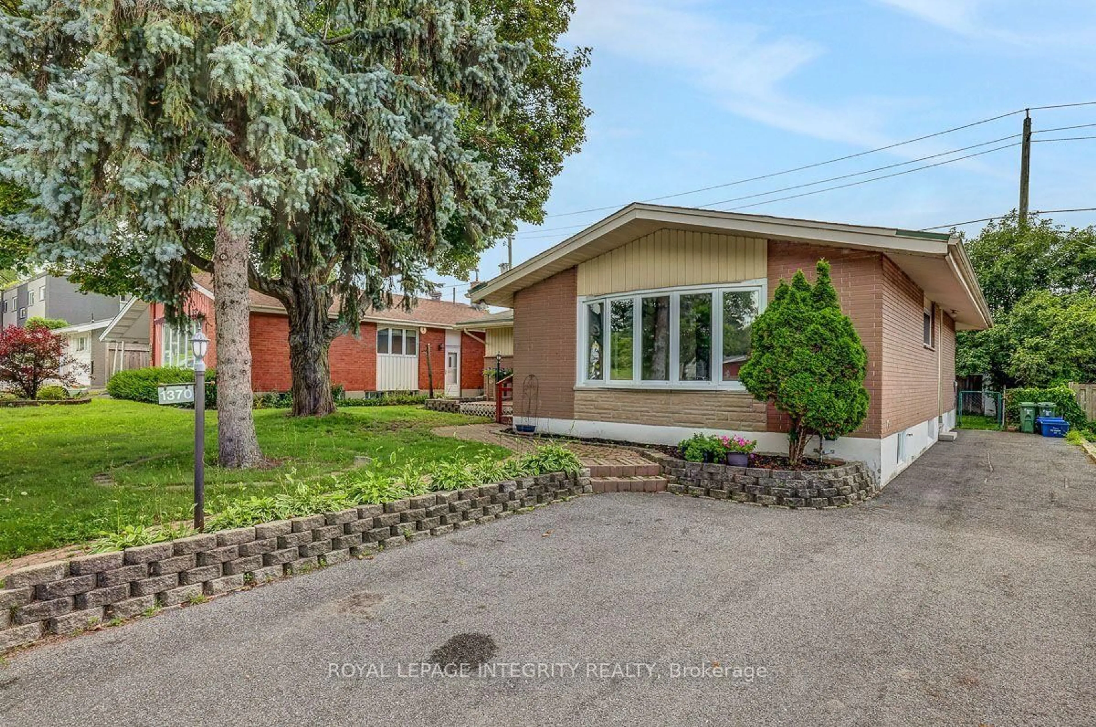 Home with brick exterior material, street for 1370 Highgate Rd, Ottawa Ontario K2C 2Y6