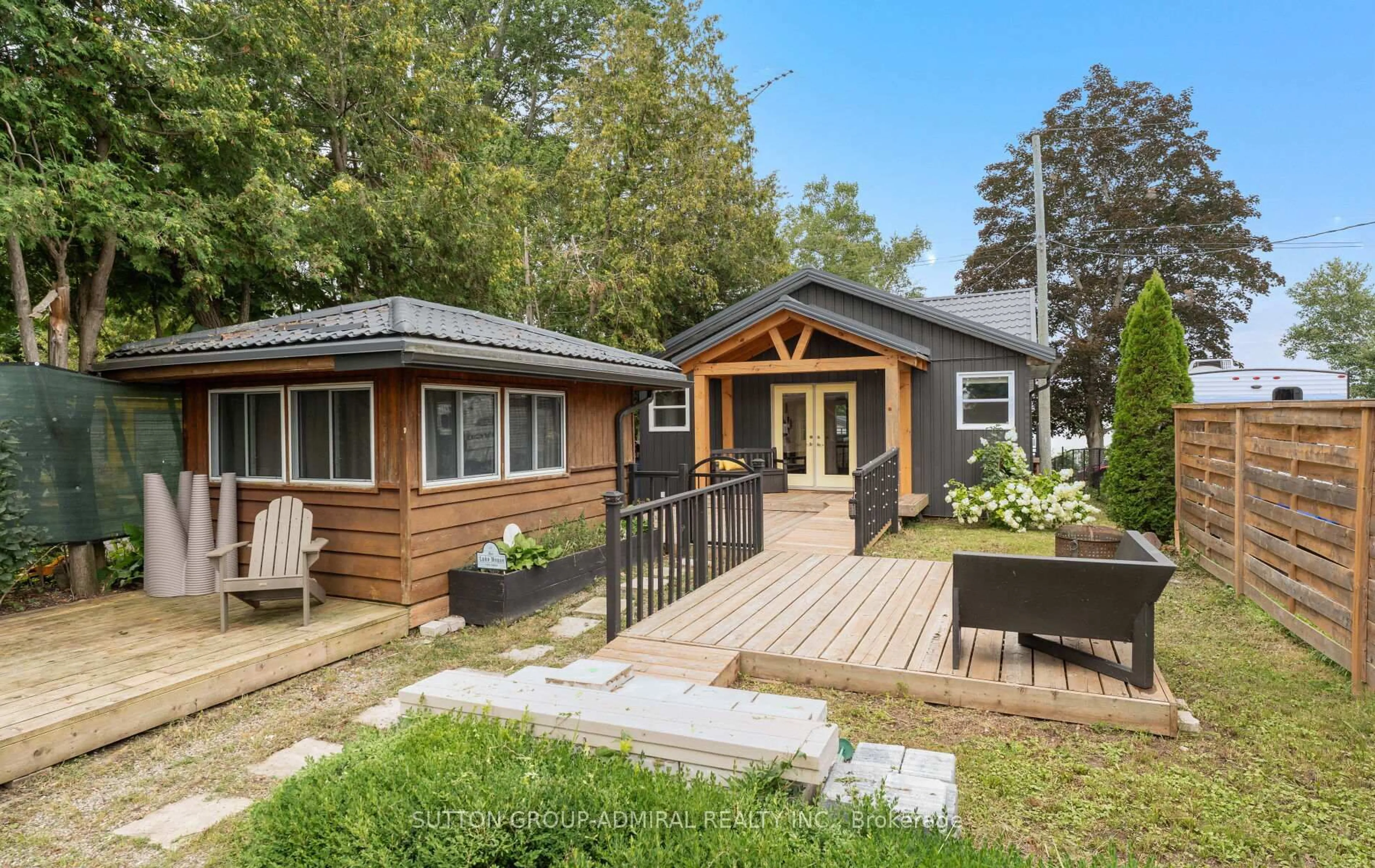 Home with vinyl exterior material, street for 309 Avery Point Rd, Kawartha Lakes Ontario L0K 1W0