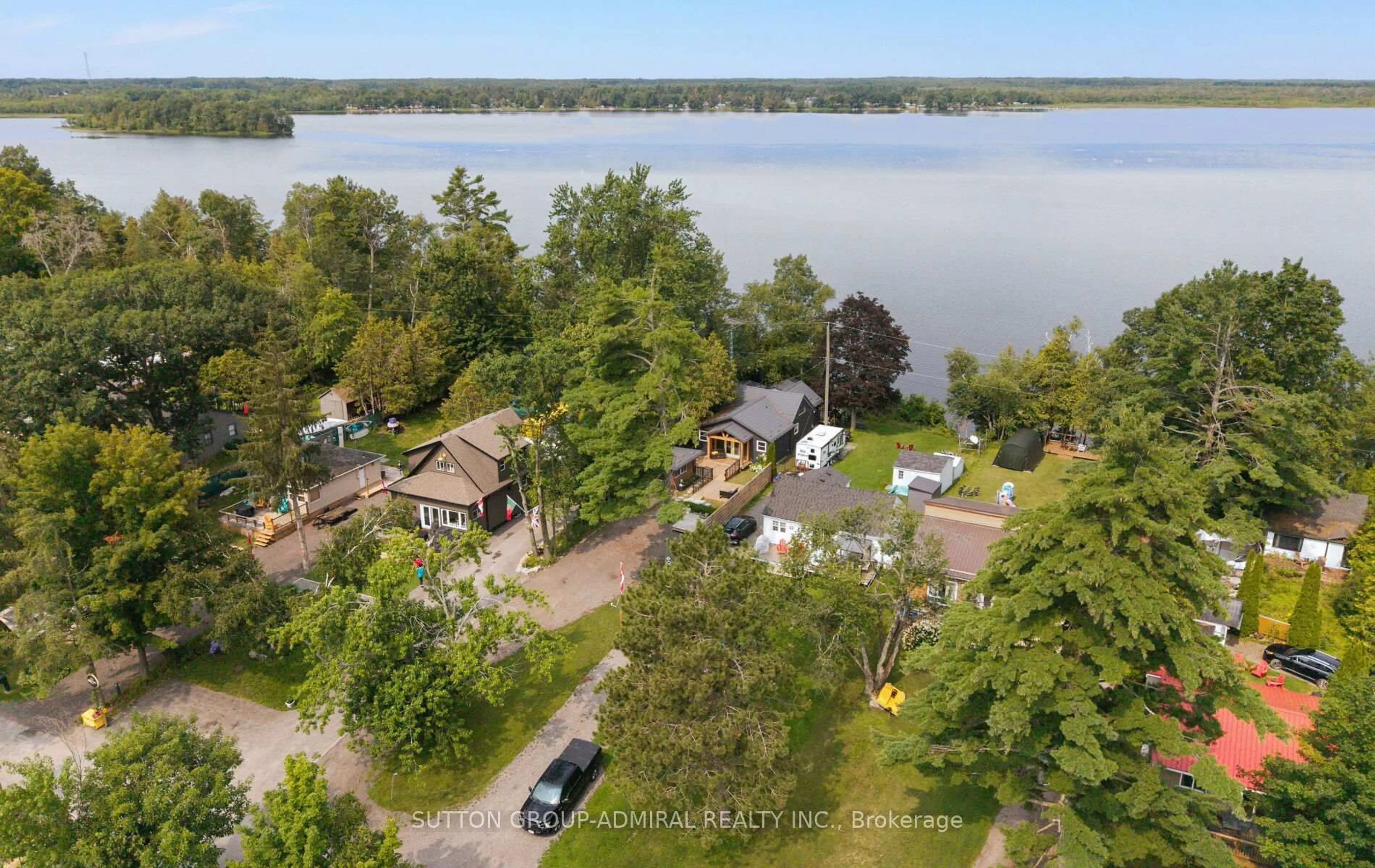A pic from outside/outdoor area/front of a property/back of a property/a pic from drone, water/lake/river/ocean view for 309 Avery Point Rd, Kawartha Lakes Ontario L0K 1W0